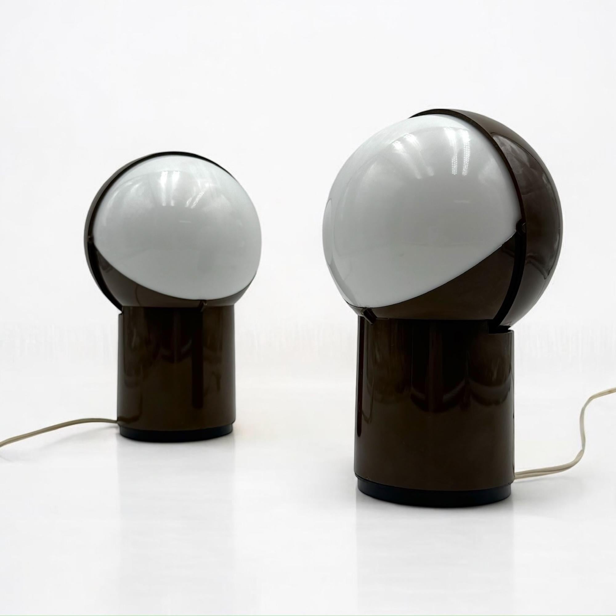This matching pair of Space Age lamps, the ‘Sfera Notte’ (Night Sphere) models by Gagiplast, Italy, exemplifies the futuristic aesthetics of 1970s design. Their sculptural forms align with the period’s geometric and alien-inspired trends, drawing