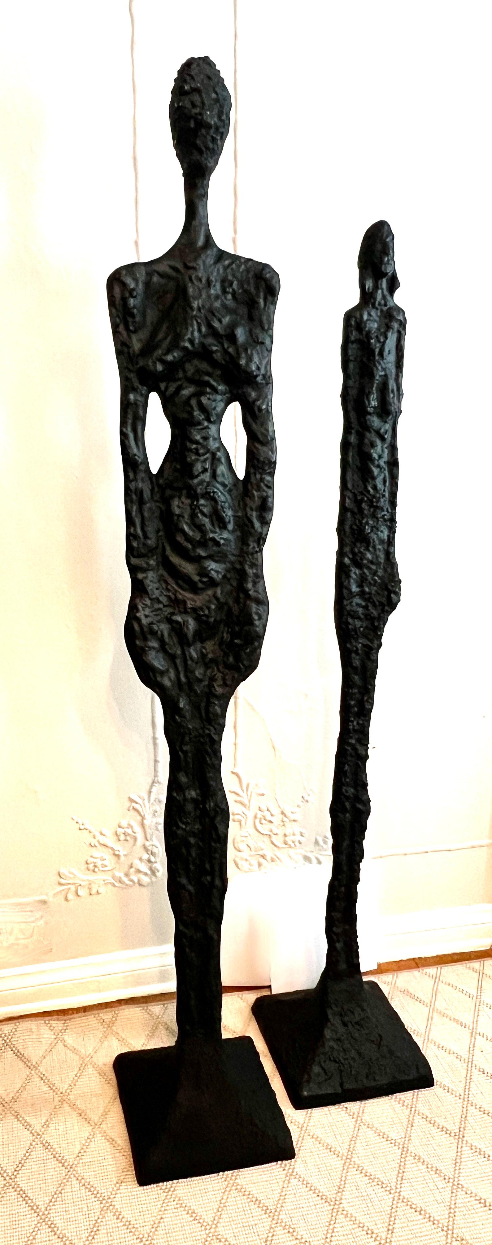 Painted Pair of 77 inch Male and 69 inch Female Sculptures in The Style of Giacometti For Sale