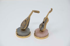 Pareja de instrumentos musicales en miniatura de plata de 800