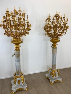 Pair of, 8ft French baroque standing lamps, with bronze decorated marble plinths