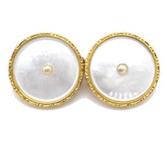Pair of 9 kt Gold Rimmed Mother of Pearl Cufflinks with Two Dress Studs