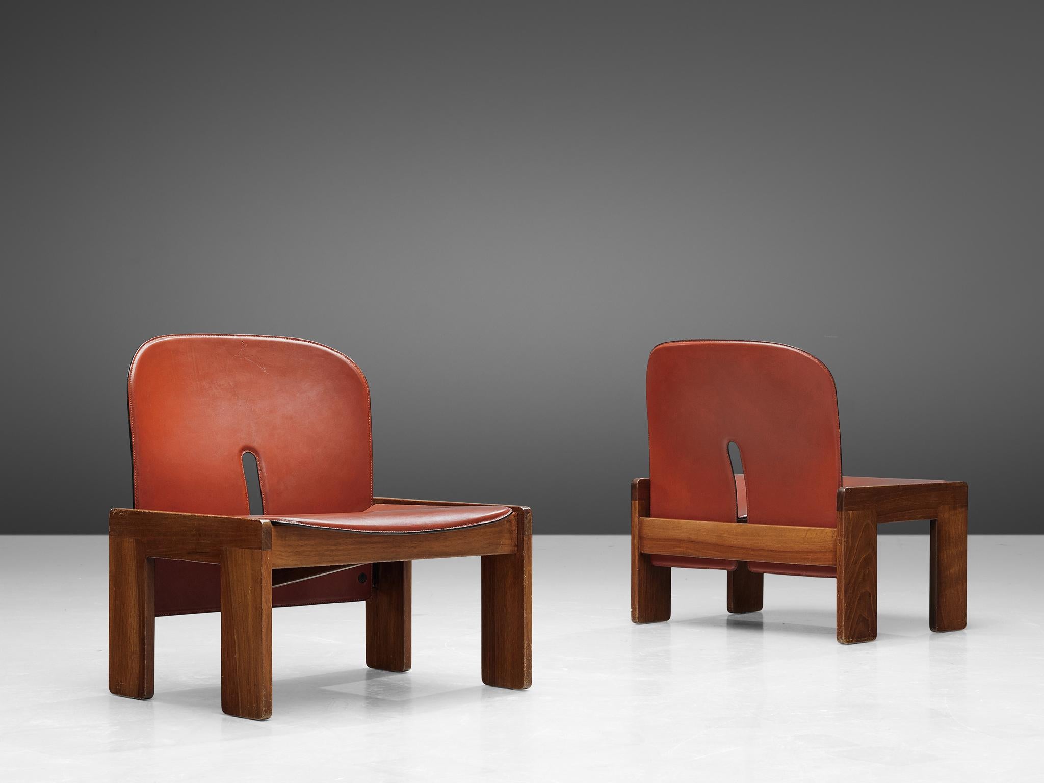 Afra & Tobia Scarpa for Cassina, pair of '925' easy chairs, walnut and leather, Italy, 1966

Set of two '925' lounge chairs by Italian designer couple Tobia and Afra Scarpa. These low chairs have a cubic and architectural appearance. The base