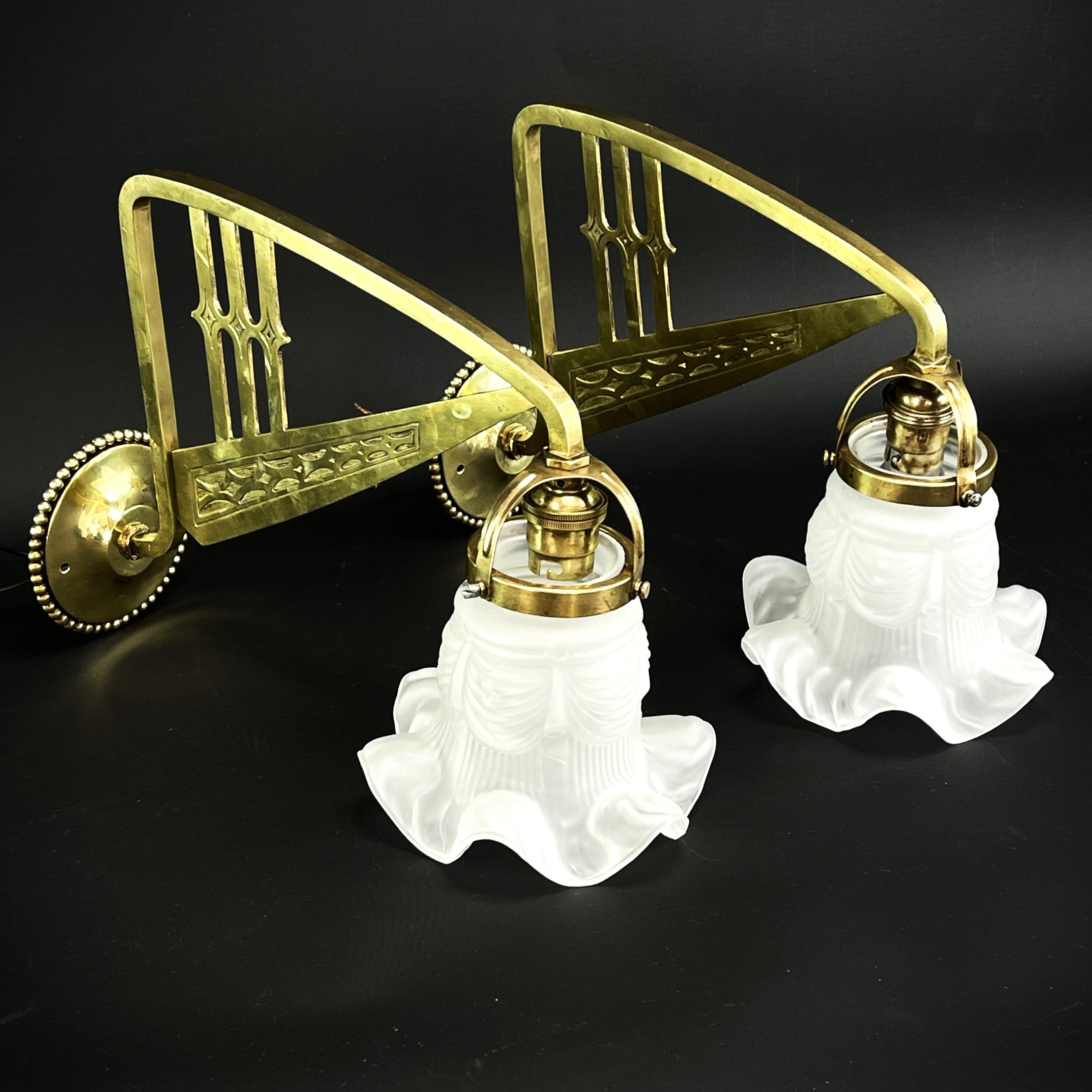 Pair Art Nouveau wall lights

These original Art Nouveau wall lights impress with their beautiful design. The two lamps provide a very pleasant light. These wall lamps are an absolute design classic from the Art Nouveau period.

Each cleaned item