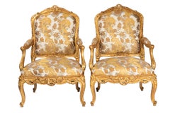 Pair of a La Reine Louis XV Style Armchairs in Giltwood, circa 1880
