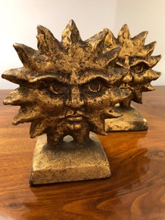 Pair of a Pair of Sun and Moon Reversible Bookends by Curtis Jere.