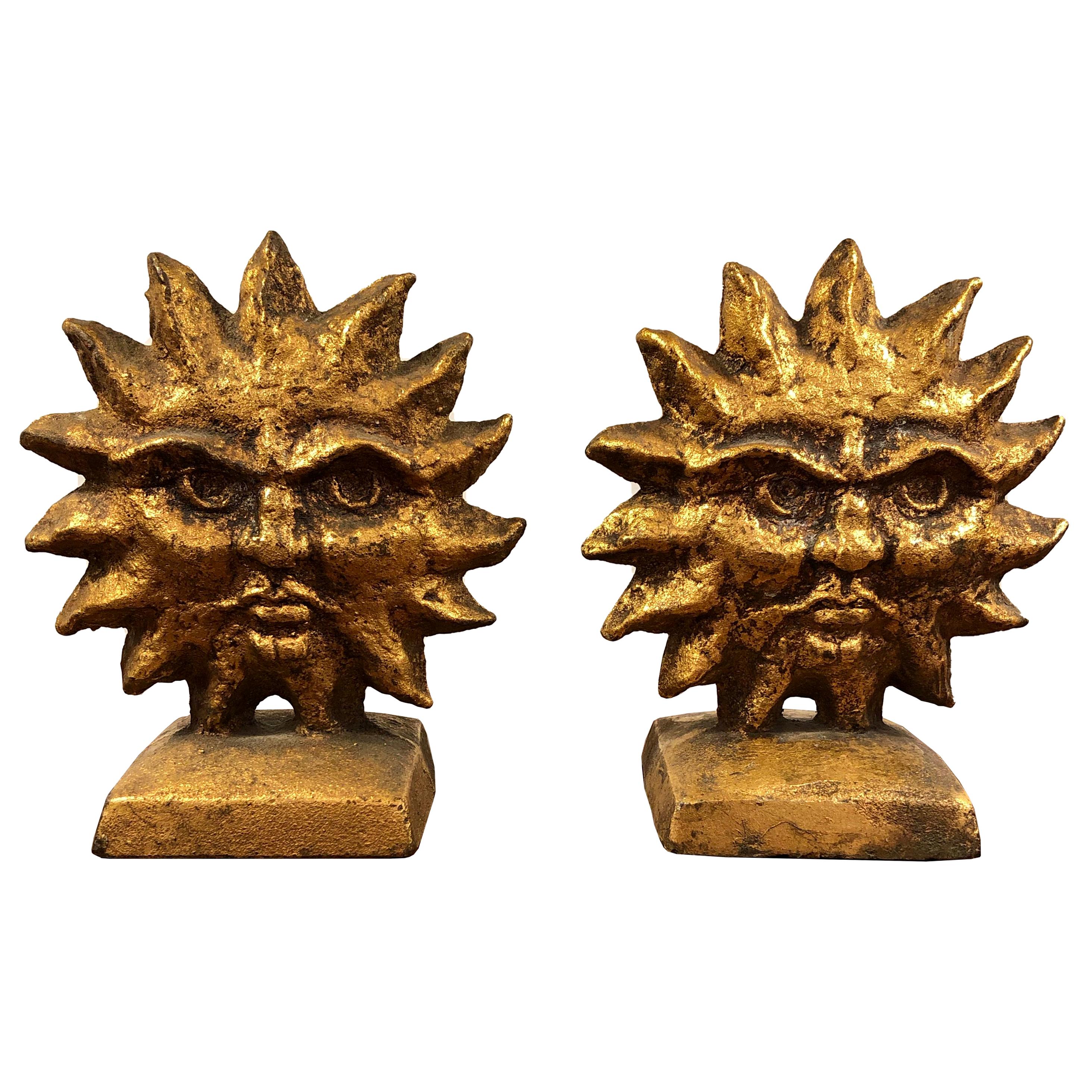 Pair of a Pair of Sun and Moon Reversible Bookends by Curtis Jere. 