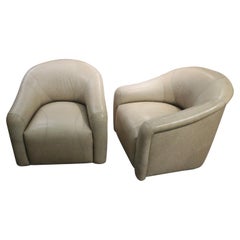 Pair A. Rudin Leather Swivel Chairs Labelled
