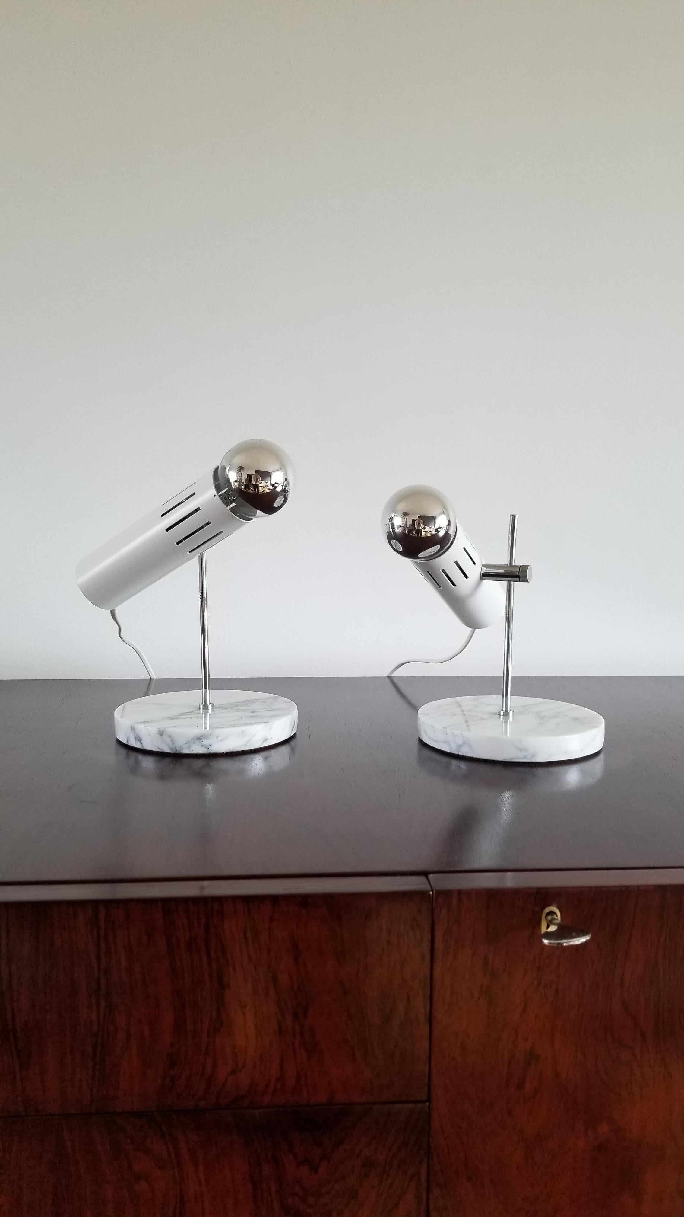 Marble, chrome, and lacquered steel table lamps. Editions Disderot, France. Good vintage condition.

Can be adjusted in height and can rotate around the pole.

European socket and wiring. Price includes rewiring for the US.