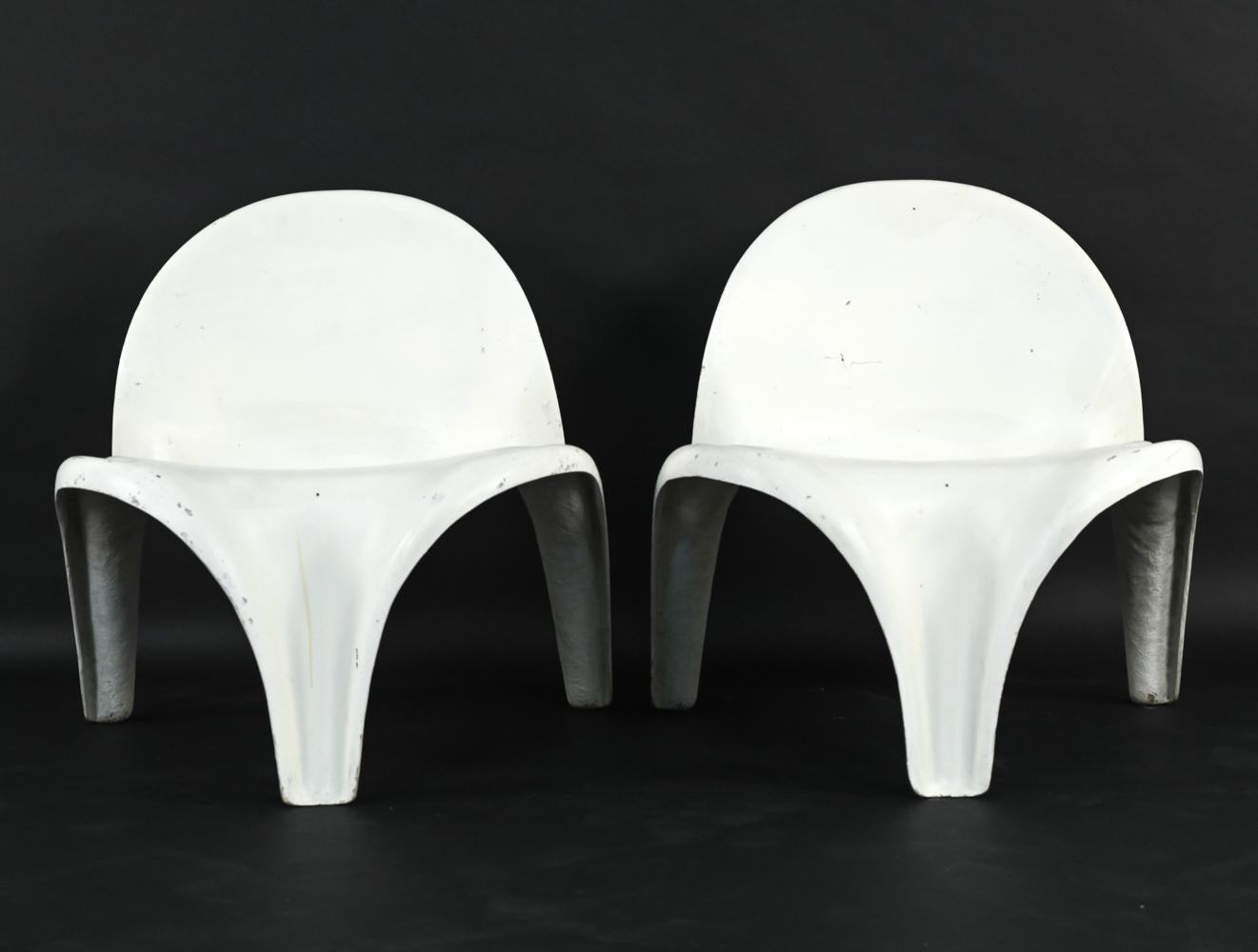 A rare and unusual pair of Danish mid-century lounge chairs designed by Aage Egeriis for France & Son, c. 1960's. Made of fiberglass-reinforced polyester, these sturdy chairs are commonly referred to as 