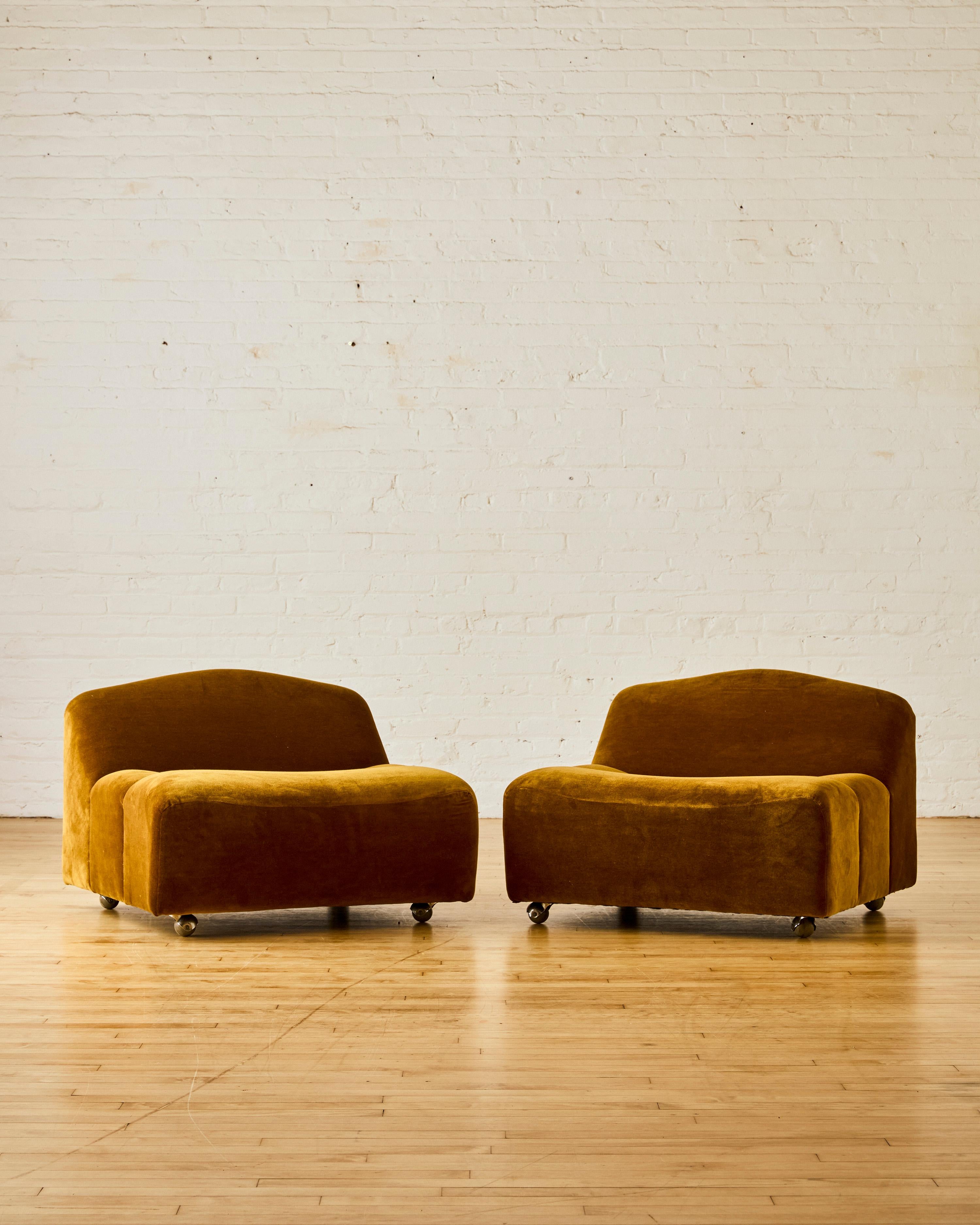 Pair of ABCD lounge chairs by Pierre Paulin for Artifort, newly reupholstered in velvet with castor chrome legs.

