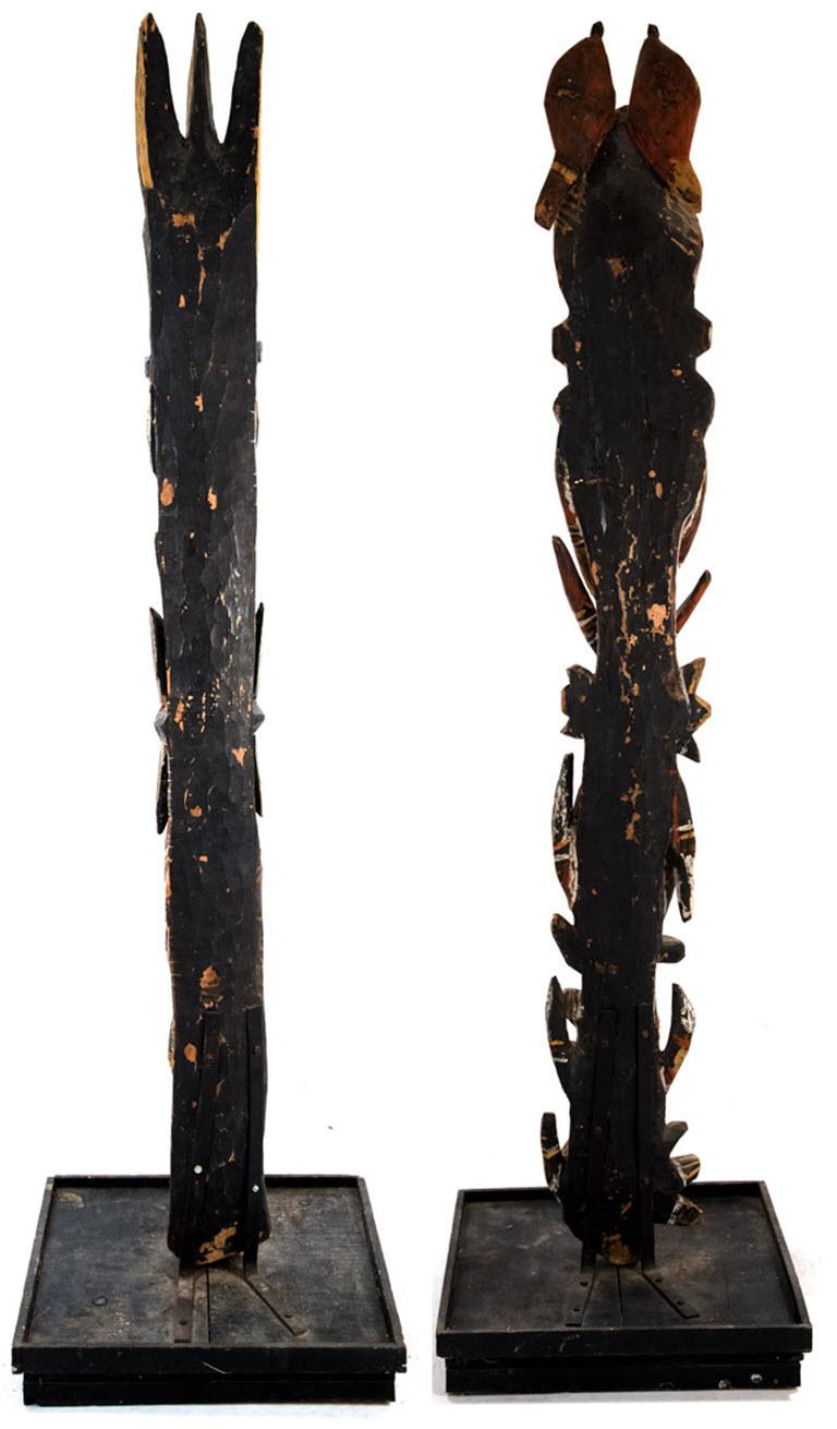 Two Abelam spirit totems dating the late 19th century and mounted on wooden plinths.

Measures: 83 x 23 1/2 x 23 1/2 inches.