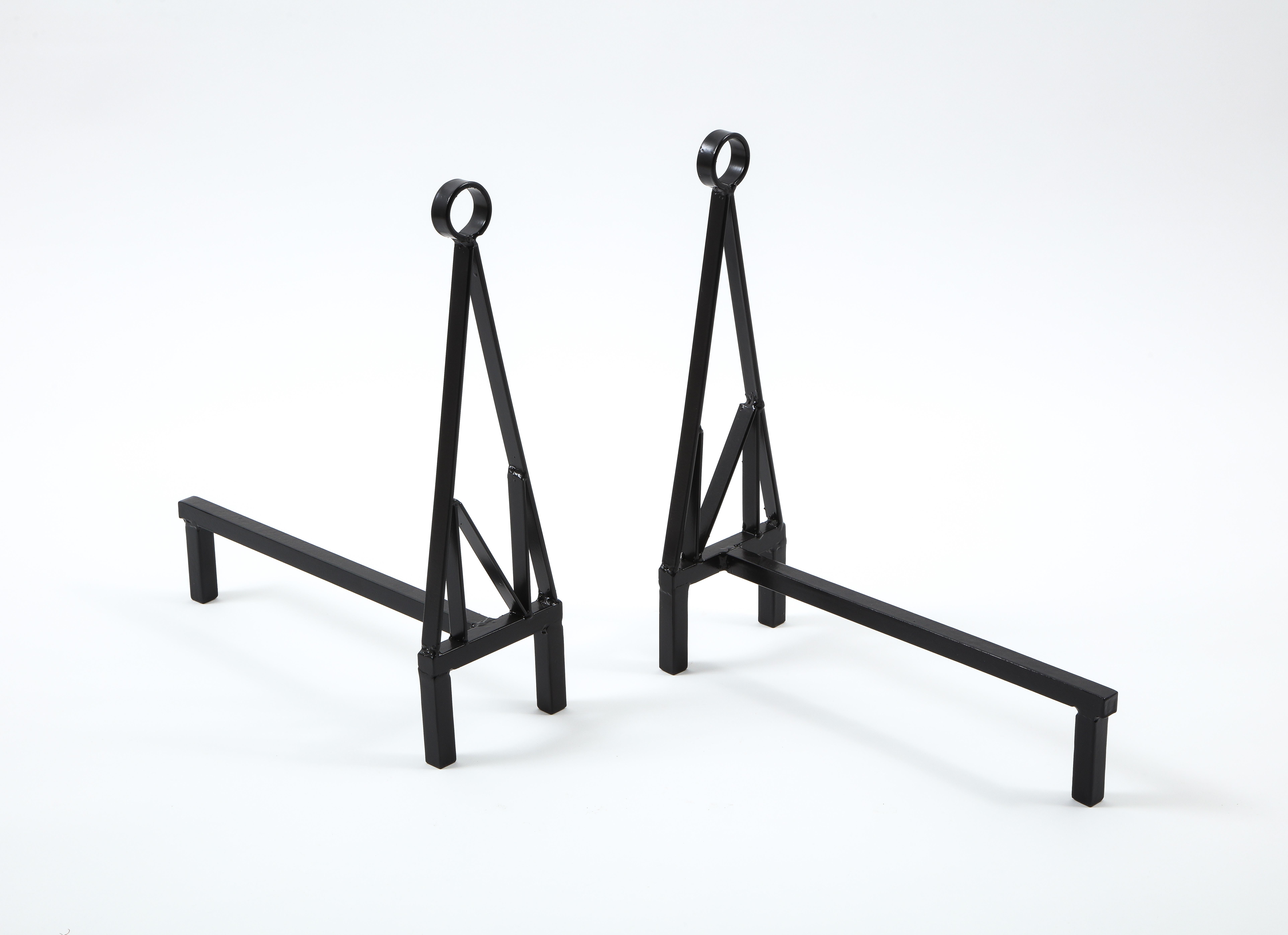 Pair of Abstract andirons in enameled steel.