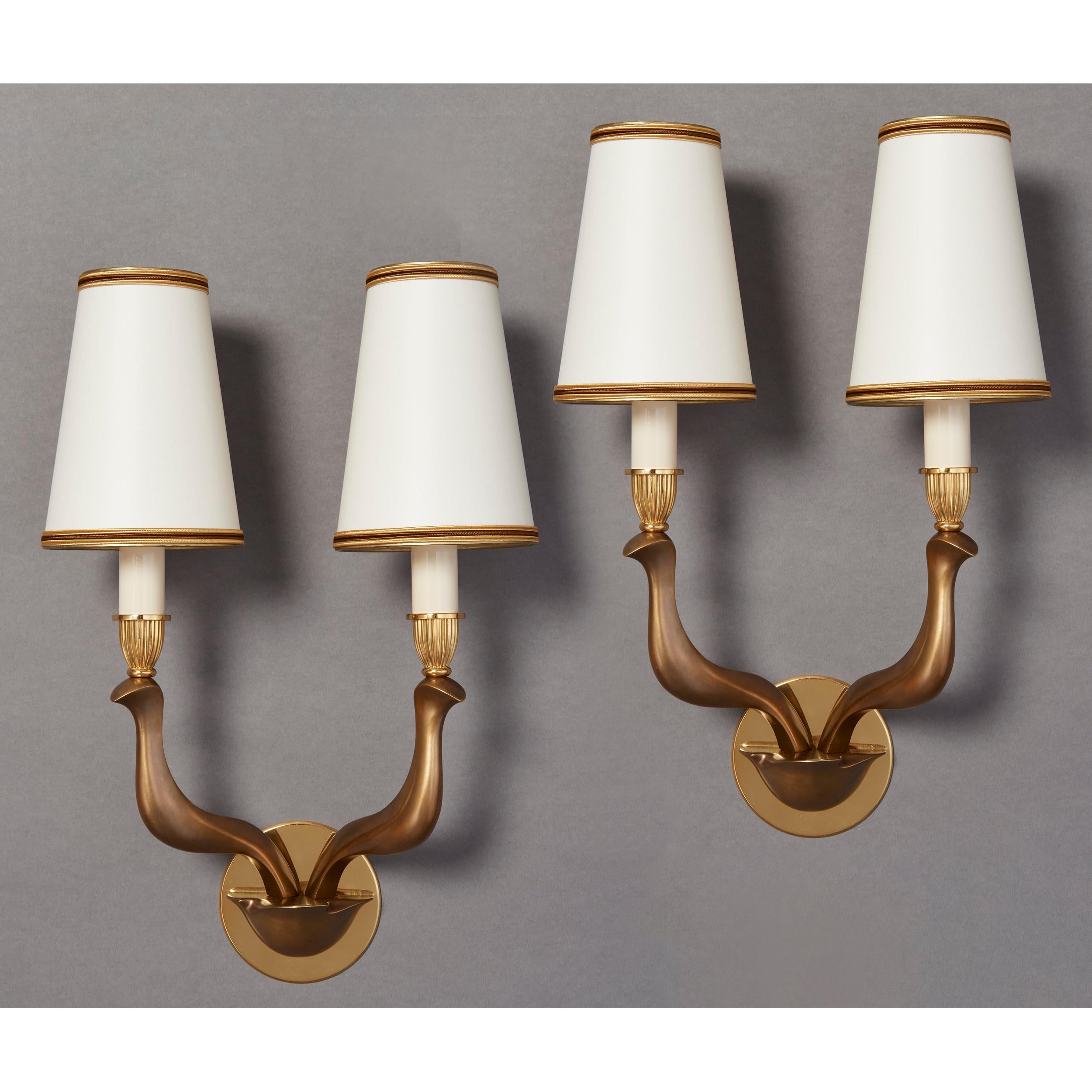 Italy, 1960's
A pair of beautiful modernist sconces, abstracted avian forms in oxidized bronze with polished brass mounts
Measures: 13 W x 19 H x 7 D
Rewired for use in the USA with candelabra base bulbs, fitted with backplate for American electric