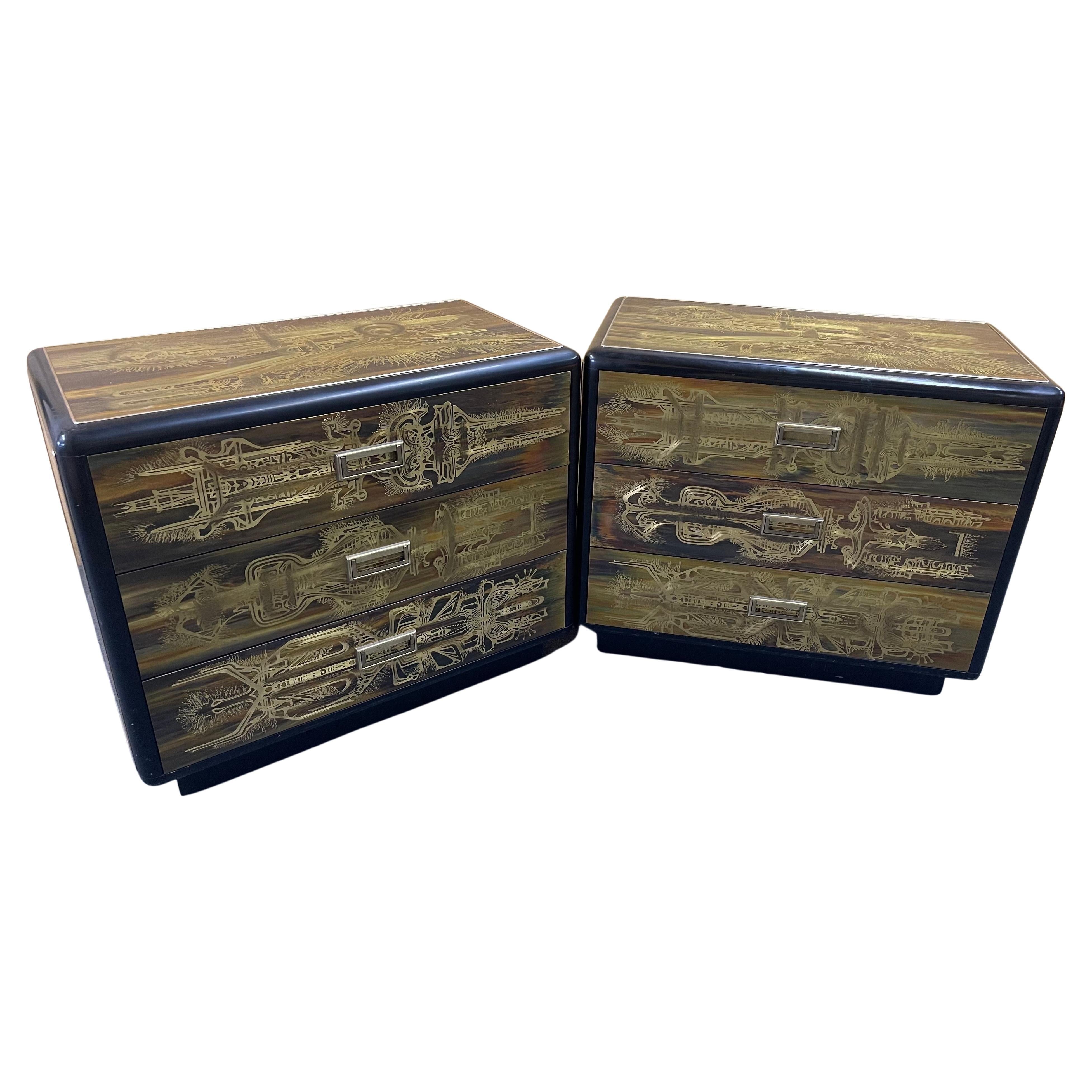 An nice and rare pair of acid-etched brass with ebony lacquer three drawer dressers / commodes by Bernhard Rohne for Mastercraft, circa 1970s. Covering each case are abstract designs in Rohne's signature surface treatment of acid-etched brass and