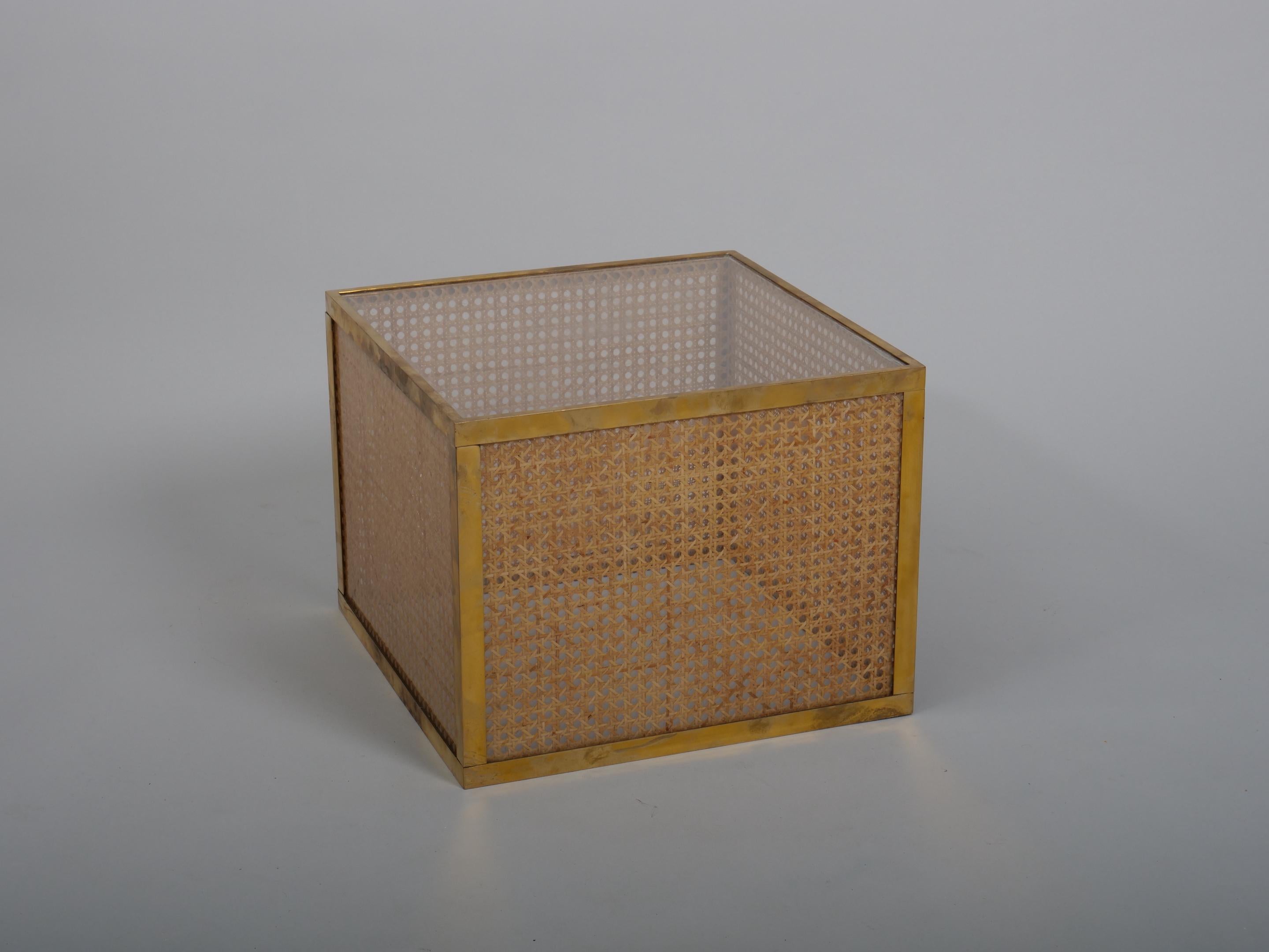 Side tables in acrylic and rattan with brass detailing. 

Italy c1970. In the style of Christian Dior