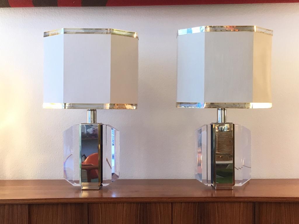 Very elegant and decorative pair of table lamps
Acrylic, chrome and brass base, paper shade with chrome and brass trim
Ca. 10kgs each
In the manner of Romeo Rega lamps
High quality.