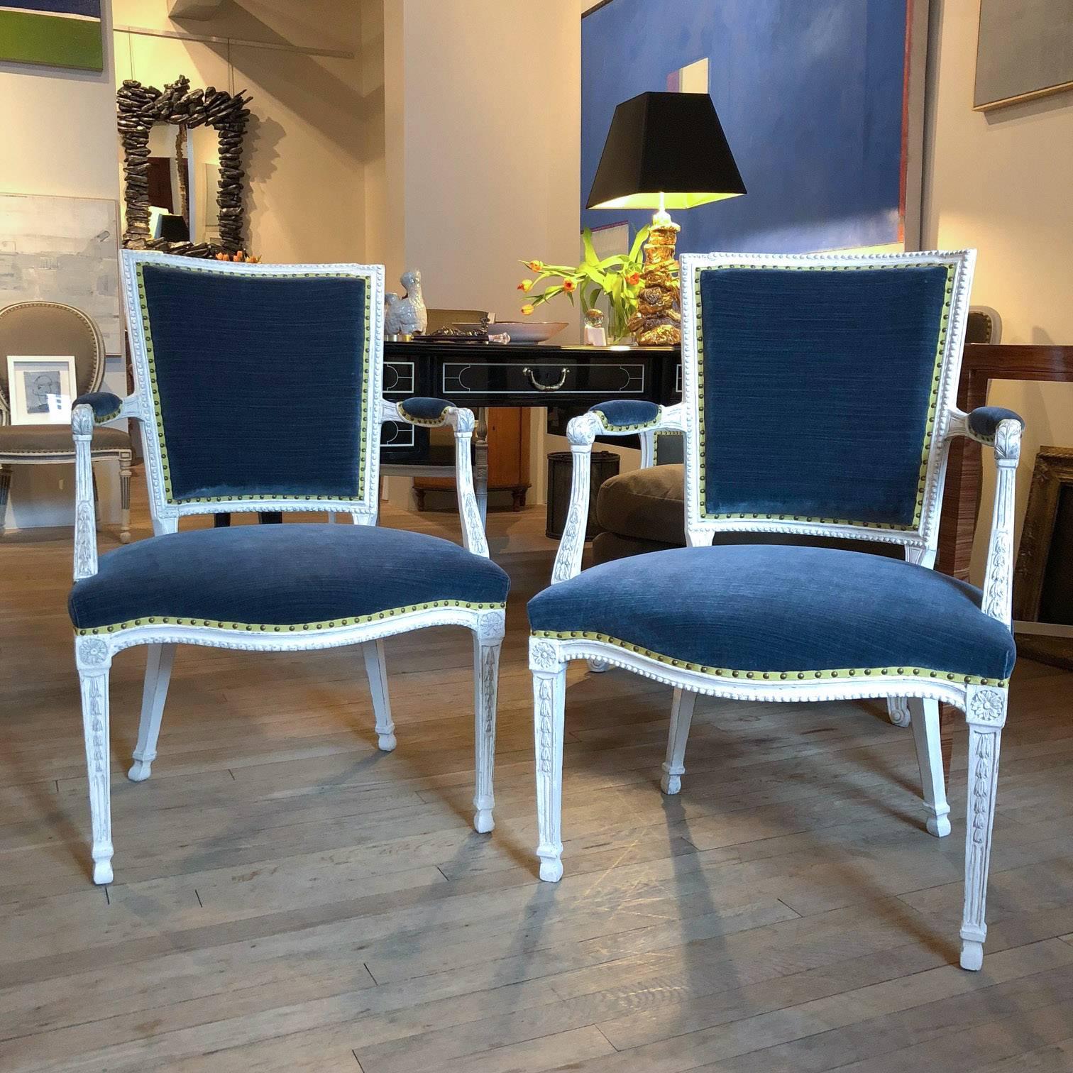 Pair of Adam Gessoed armchairs
English, circa 1790
Now upholstered with blue cotton velvet, grosgrain ribbon and French nailhead.