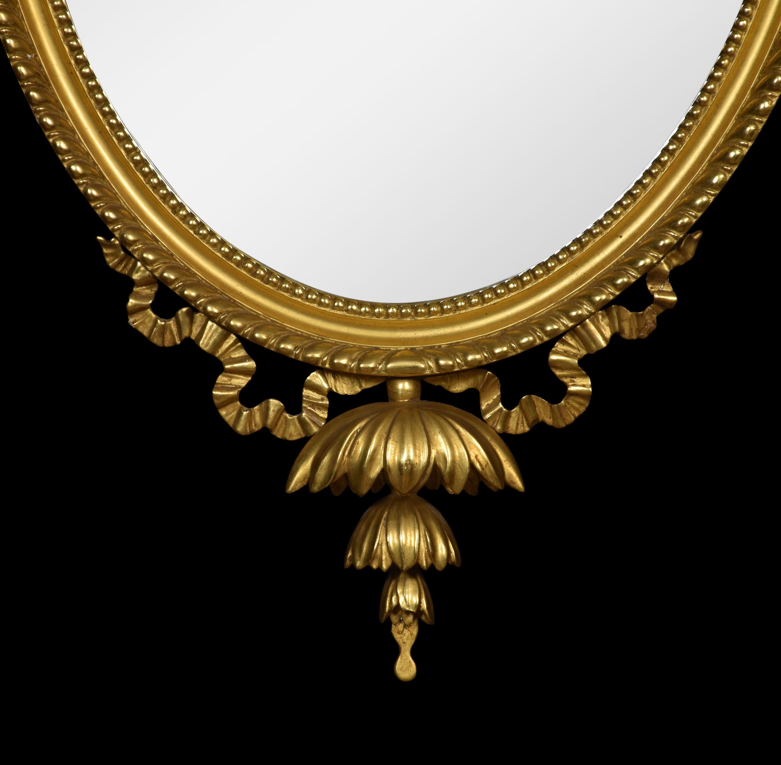 British Pair of Adam Revival Gilt Framed Oval Mirrors
