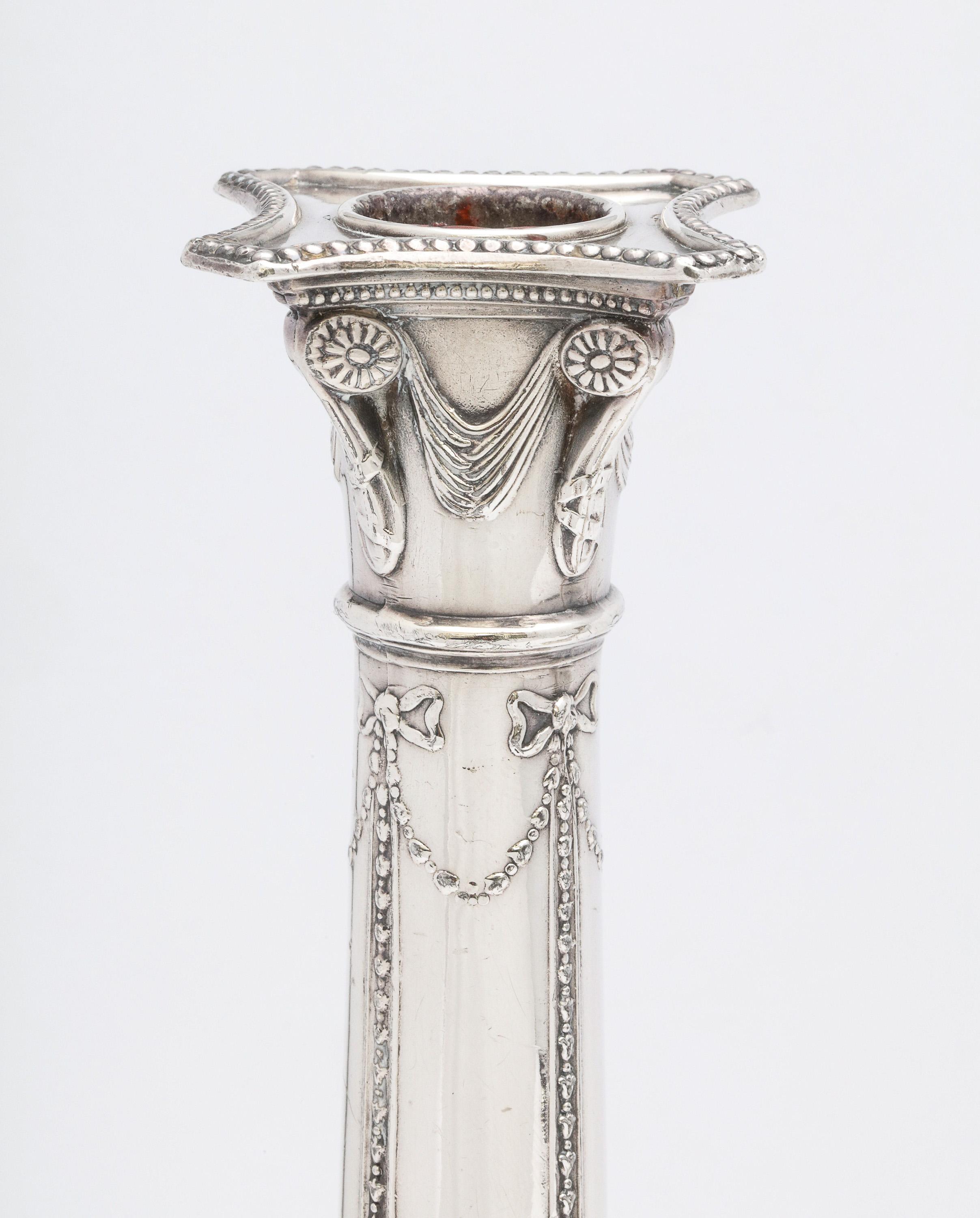 Early 20th Century Pair of Adams-Style Sheffield Plated Column-Form Candlesticks