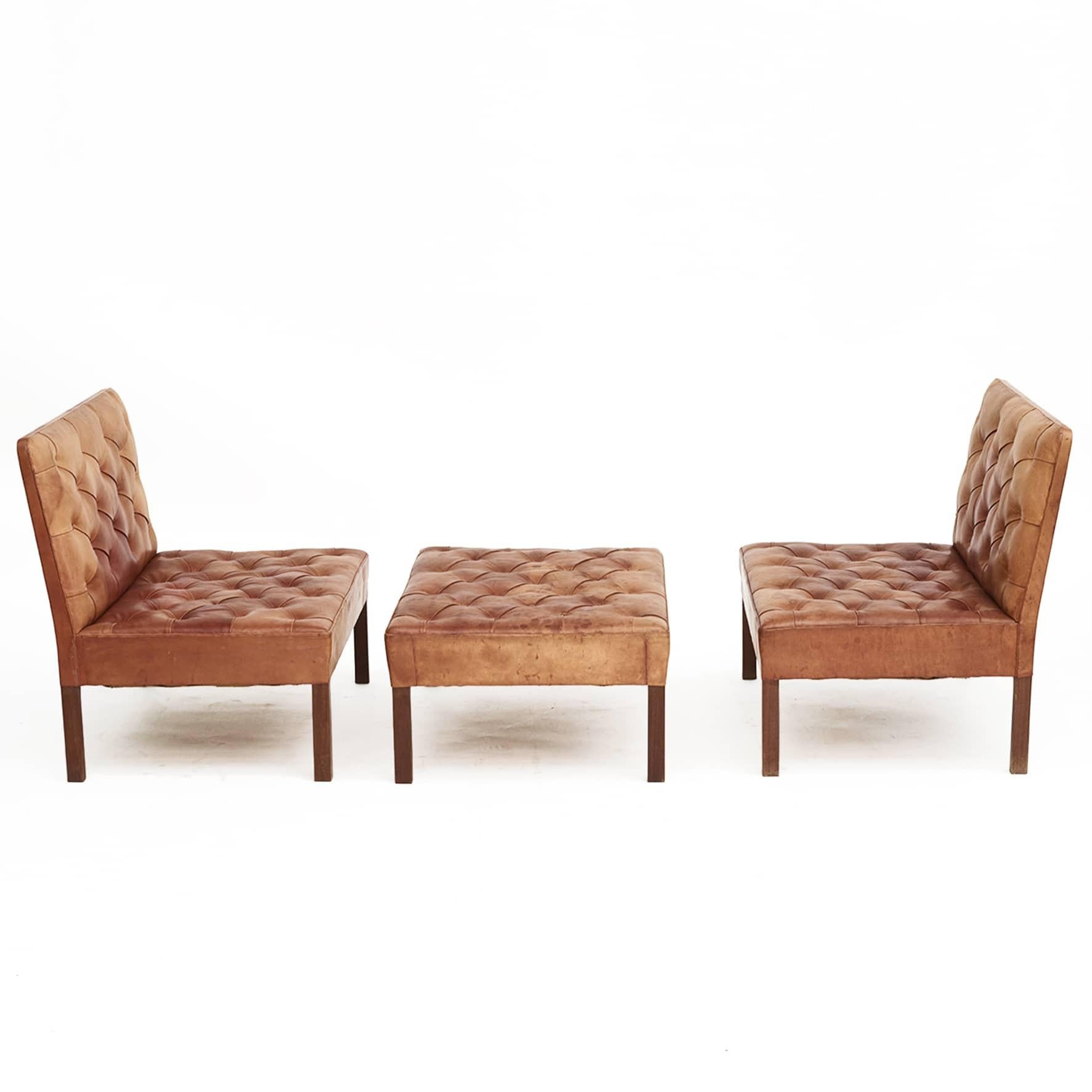 Scandinavian Modern Pair of Addition Leather Sofas and a Low bench/stool By Kaare Klint