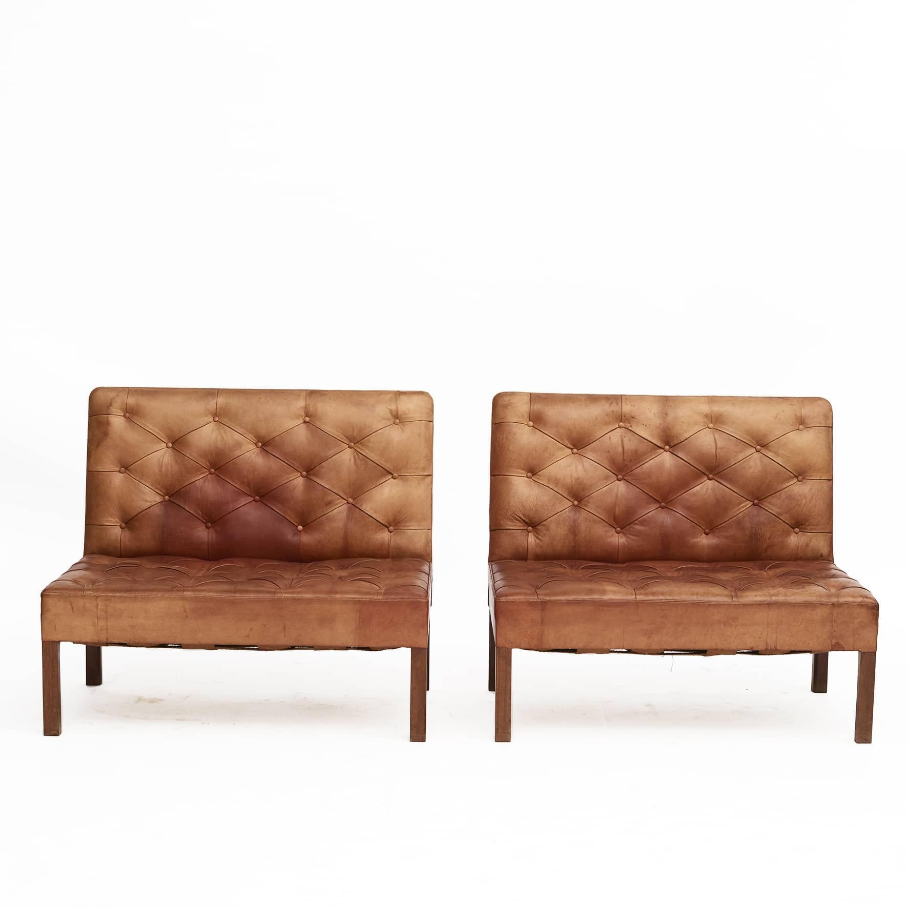 Danish Pair of Addition Leather Sofas and a Low bench/stool By Kaare Klint