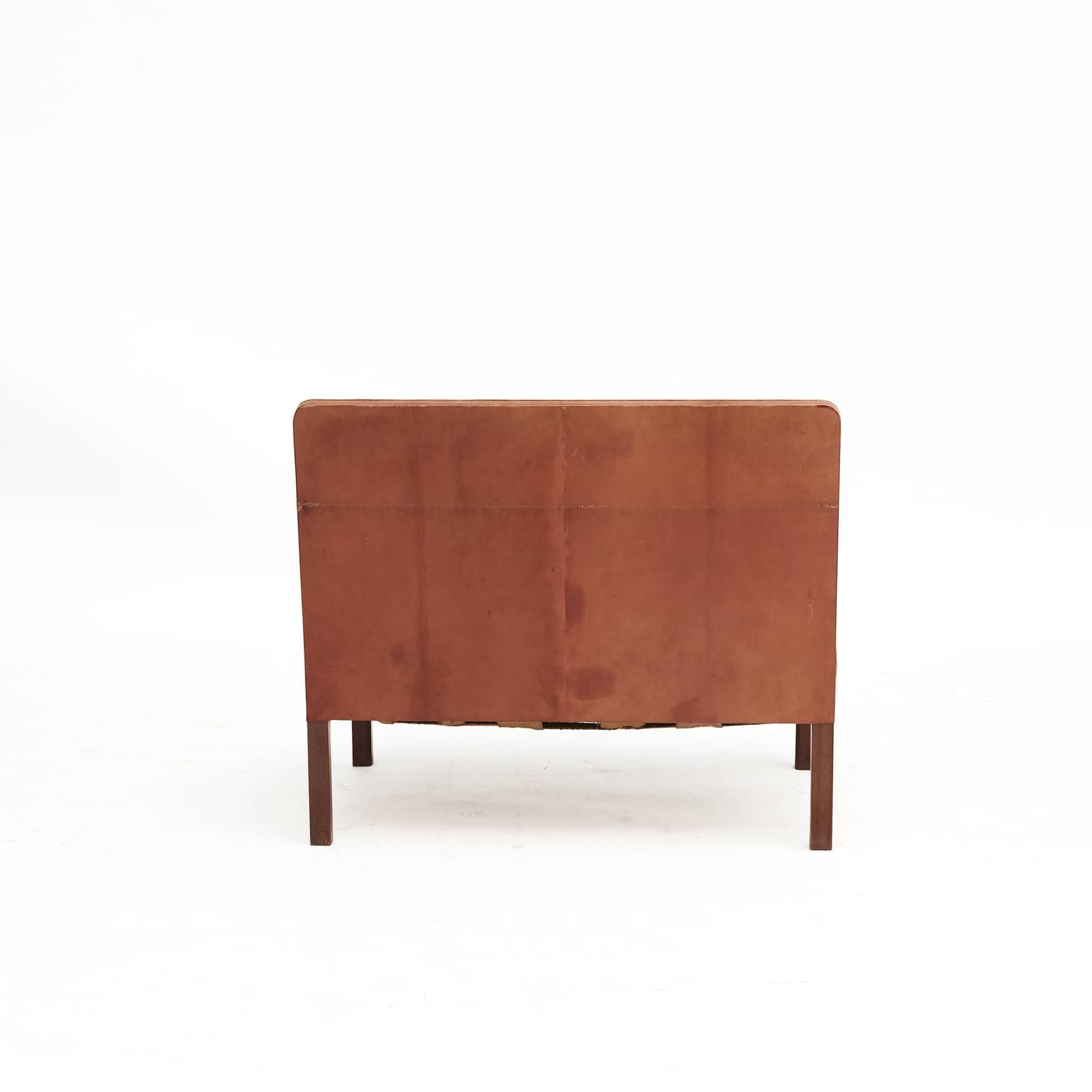 Pair of Addition Leather Sofas and a Low bench/stool By Kaare Klint 3