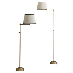 Coppia di lampade da terra regolabili in ottone con paralume in tessuto - anni '70