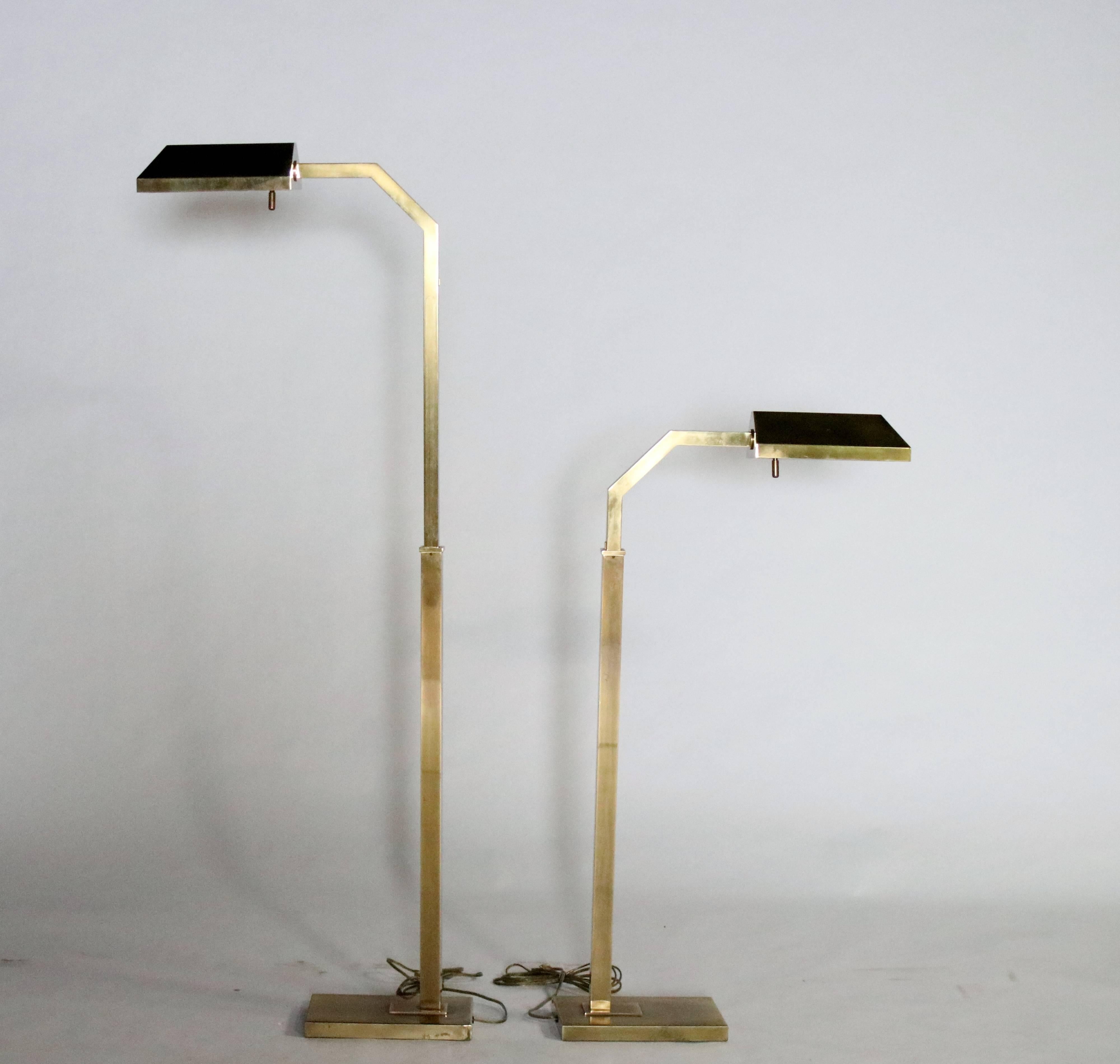 Pair of adjustable brass reading lamps by E.F. Chapman. Each lamps adjusts from 38