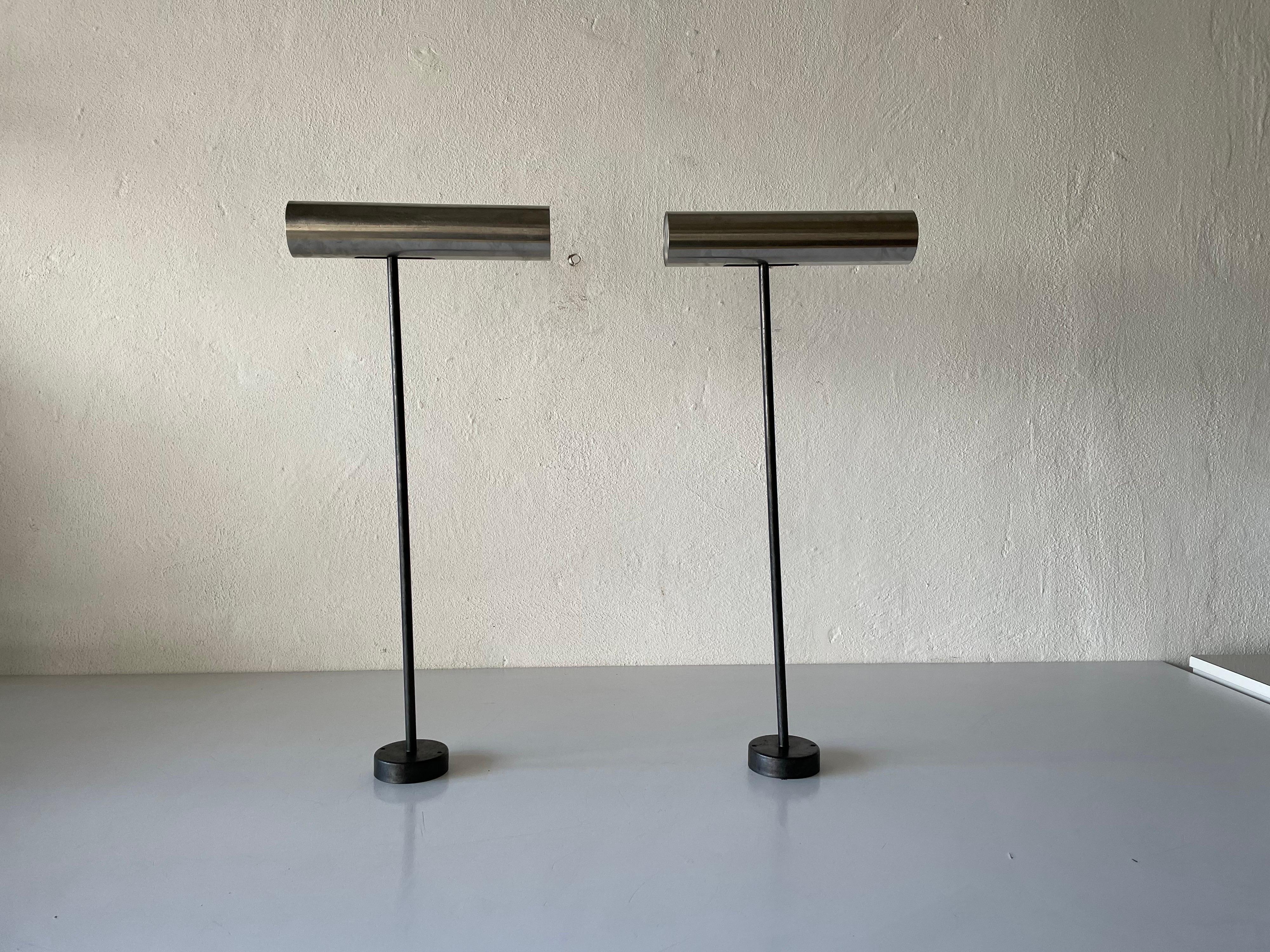 Pair of French ceiling spots or wall lamps, 1950s, France

Very elegant and Minimalist sconces
Adjustable lampshades
Lampshade is made of chrome
Rod is made of stainless steel

Lamps are in very good condition.

These lamps works with E27
