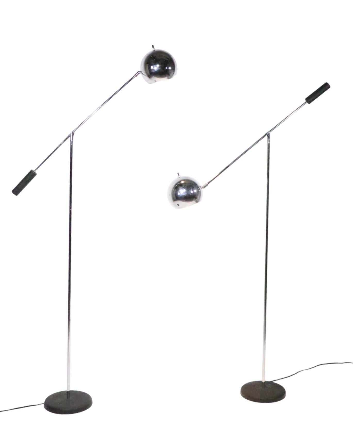 American Pair of Adjustable Chrome Eyeball Orbiter Floor Lamps by Sonneman C 1970s