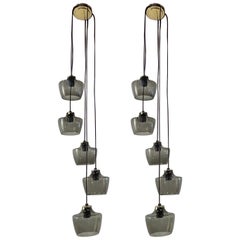 Coppia di lampadari regolabili europei in ottone e vetro