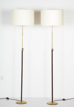 Pair of Adjustable Floor Lamps by Jacques Adnet