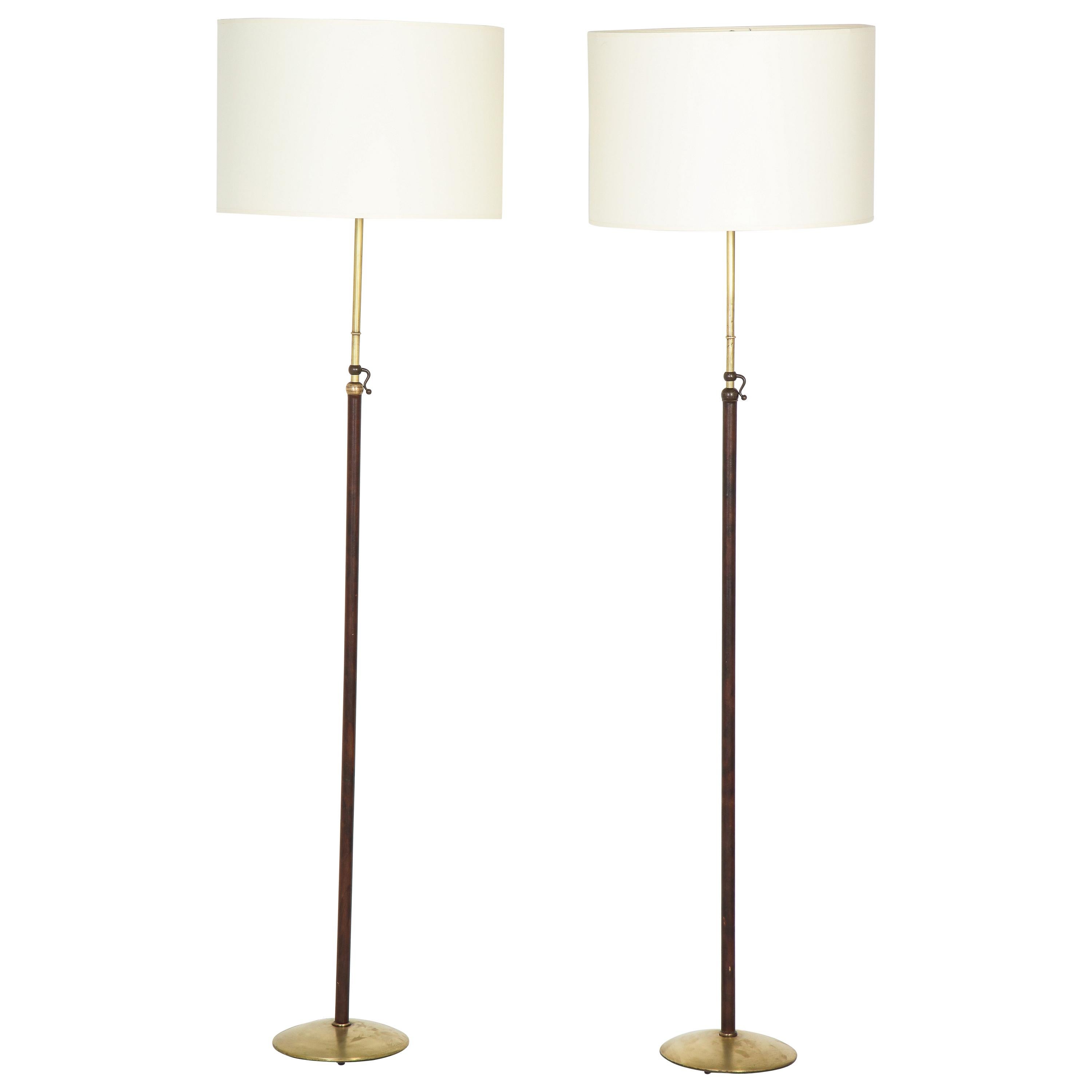 Pair of Adjustable Floor Lamps by Jacques Adnet For Sale