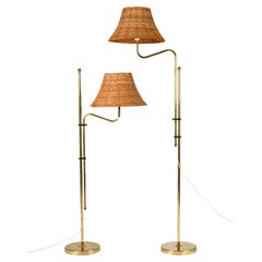 Ein Paar verstellbare Stehlampen aus Messing mit Rattanschirmen, Bergboms, 1960er Jahre