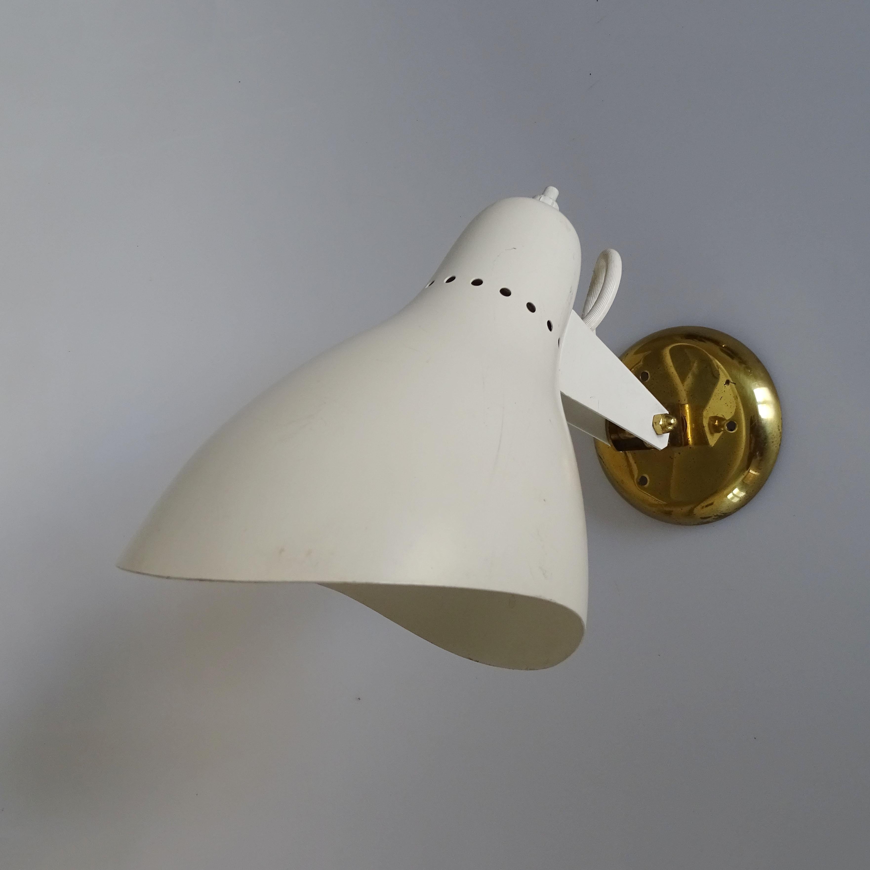 Pair of adjustable Italian 1950s wall lamps by Greco. For Sale 1