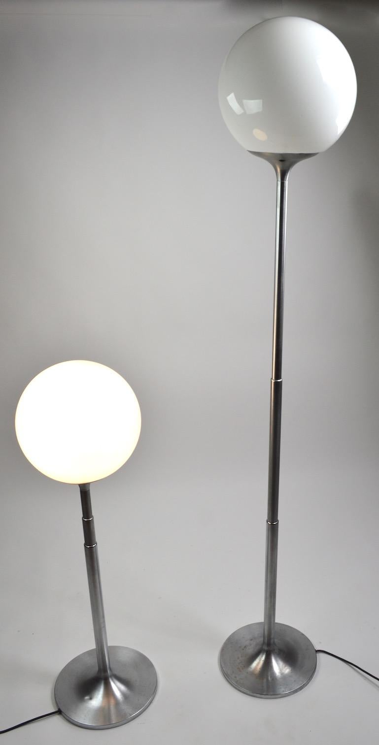 International Style Pair of Adjustable Steel and Glass Floor Lamps Attributed to Kurt Versen