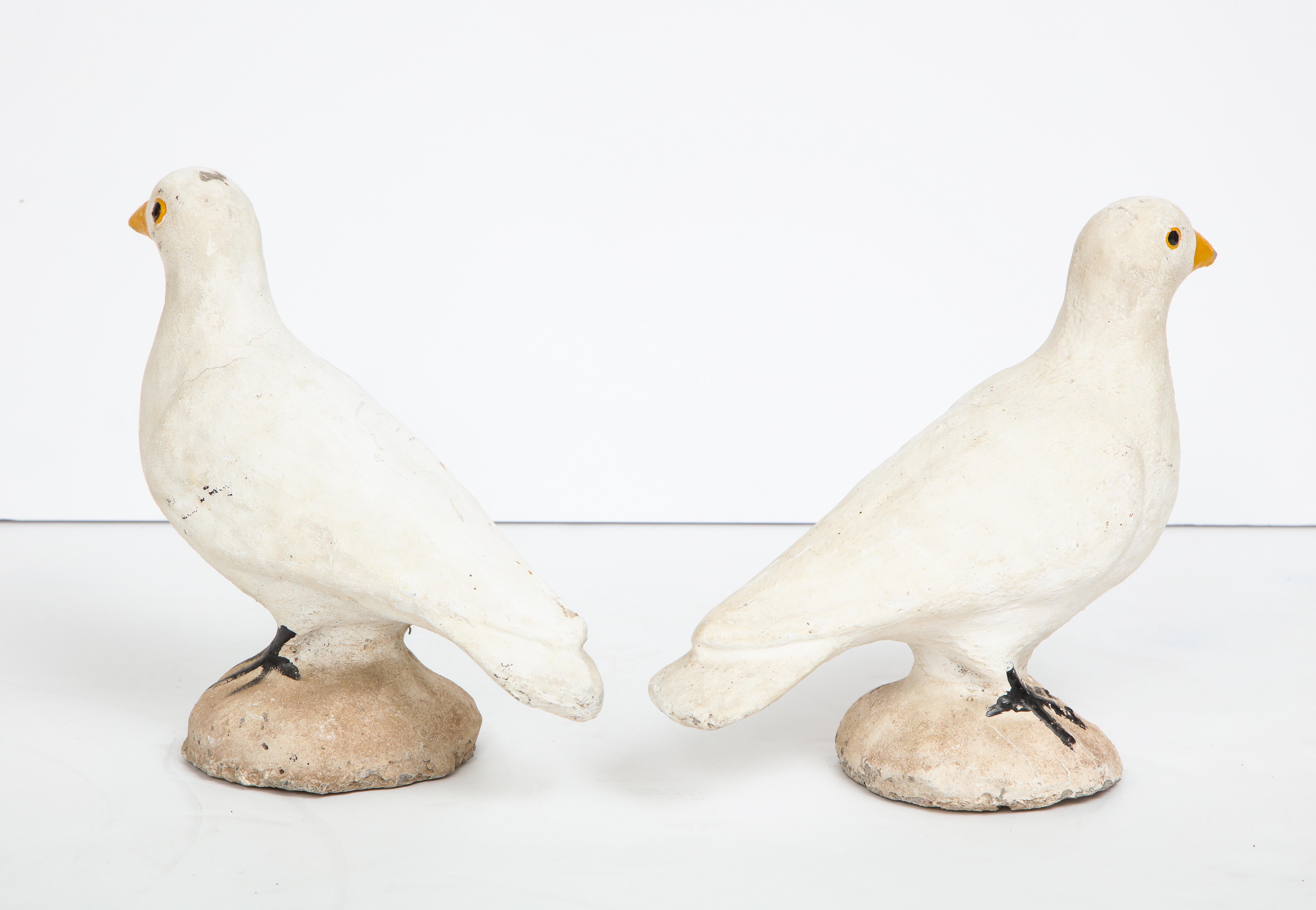 Pair of adorable cast cement doves