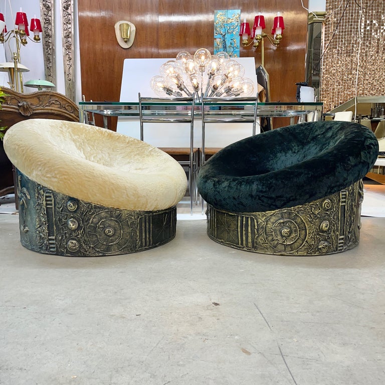 Pair of Adrian Pearsall designed round chairs for Craft Associates in 'brutalist' style sculpted bronze resin 'goop' over molded drum-form plywood frame, upholstered in original plush faux fur.
One black, the other off-white (presents as champagne