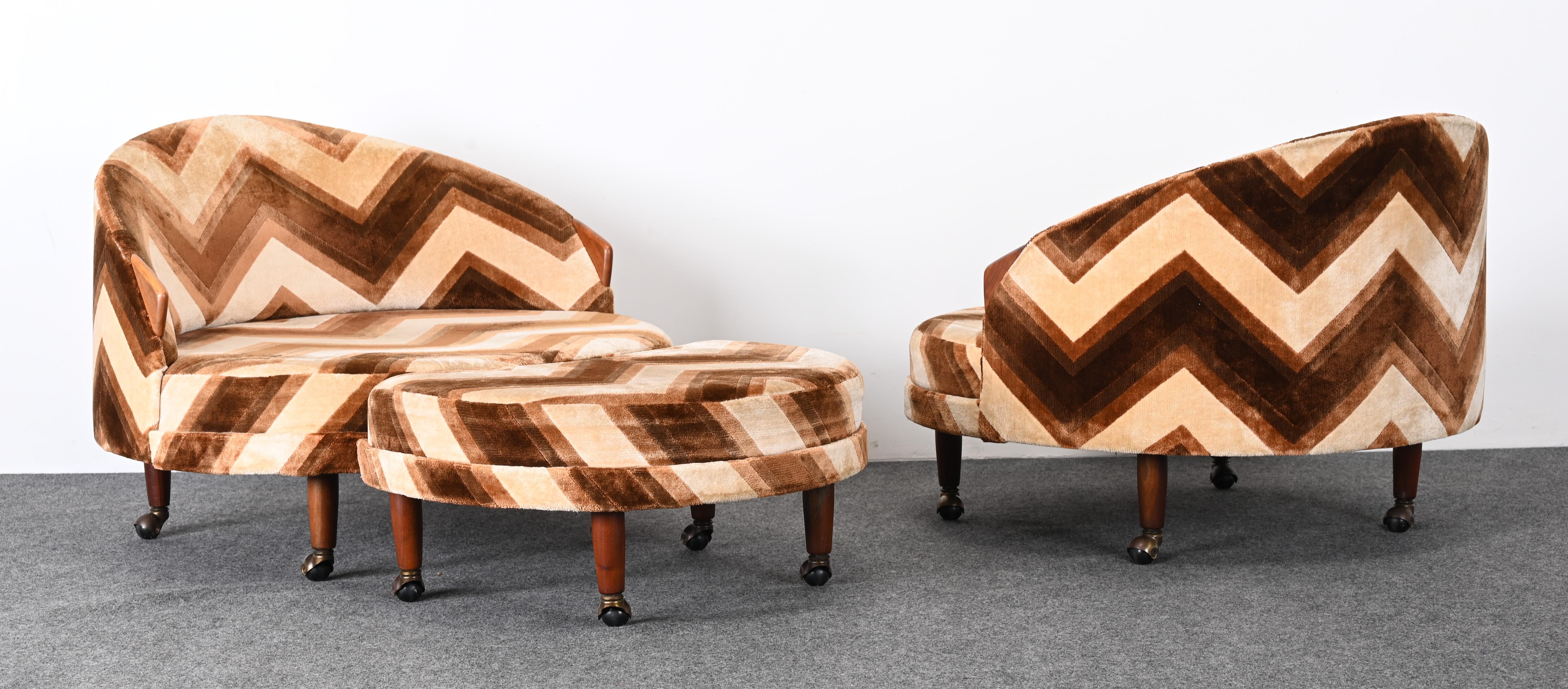A vintage pair of Adrian Pearsall Havana chairs with ottoman for Craft Associates, 1965. The fabric is vintage with age-appropriate wear. New upholstery is recommended. The classic Havana chair by Adrian Pearsall has some wear on the walnut accents