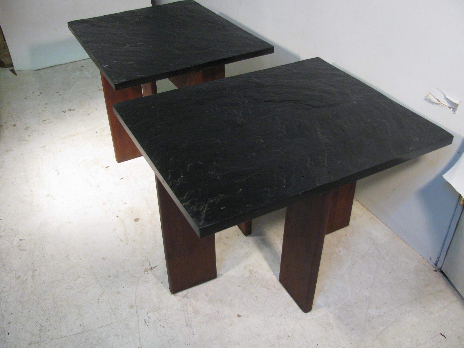 Fabulous pair of Brutalist slate top end tables by Adrian Pearsall. Solid walnut with a textured slate top. Very architectural in its design. Cocktail table in a separate listing.