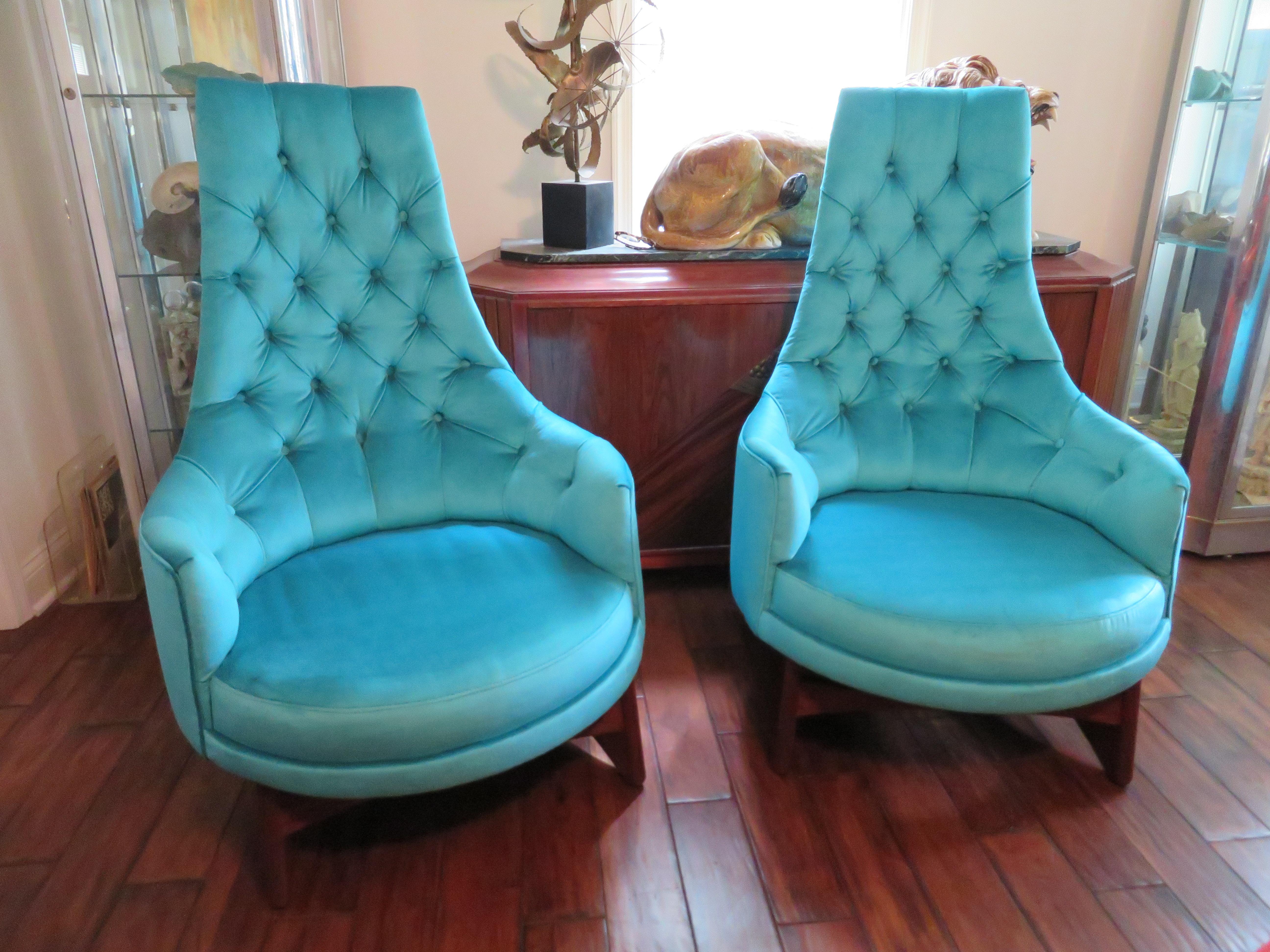 Fabulous pair of Adrian Pearsall tufted tall back lounge chairs. These are quite rare with the sculpted walnut bases and these have been totally restored to better than new condition. We used a high end turquoise velvet fabric and replaced all the