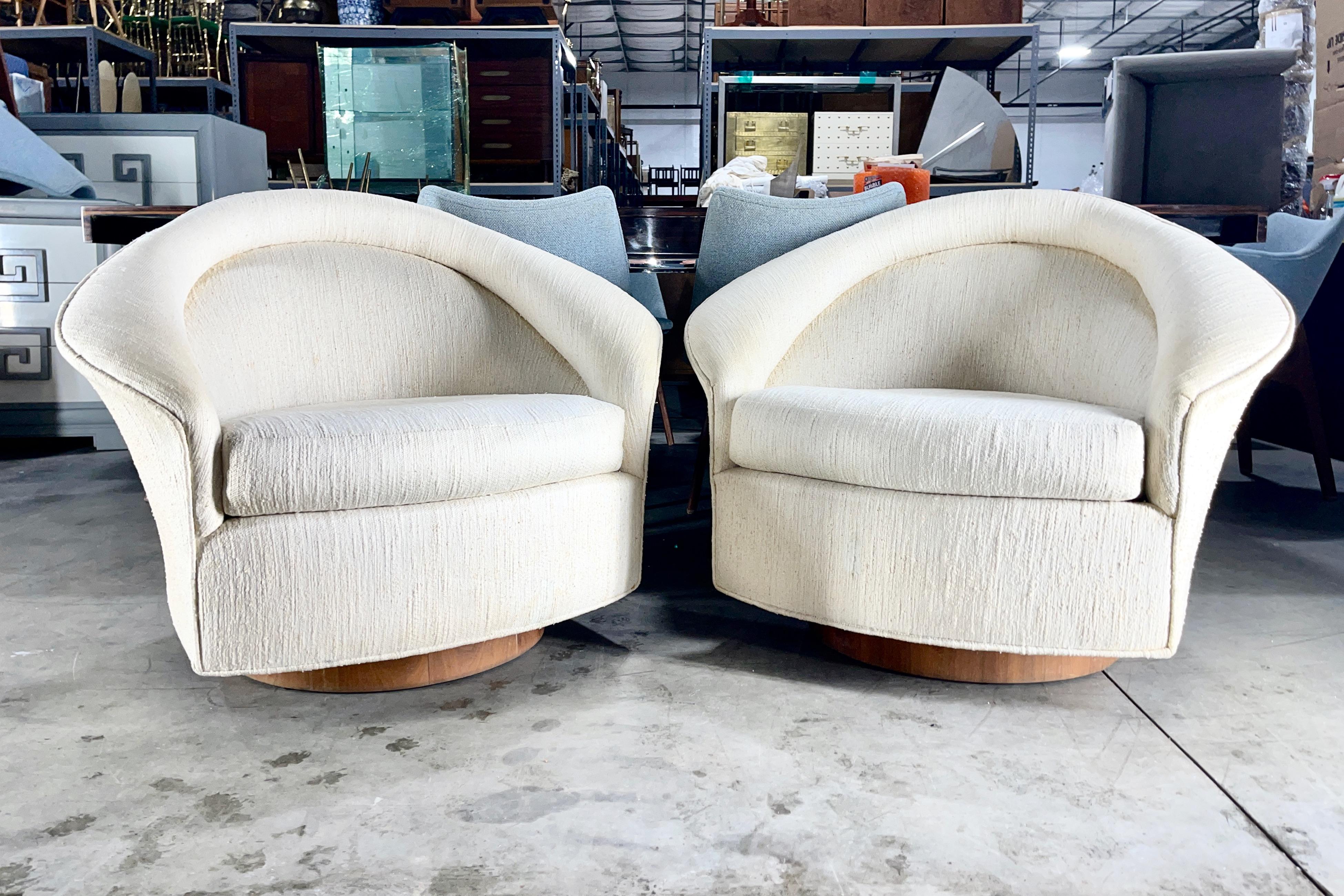 Pair of swivel rocking lounge chairs designed by Adrian Pearsall for Craft Associates which was acquired in 1969 by Lane of Alta Vista. Original Craft/Lane label present.
Distinctive sculptural arms similar to the Diamond sofa and lounge by Gio