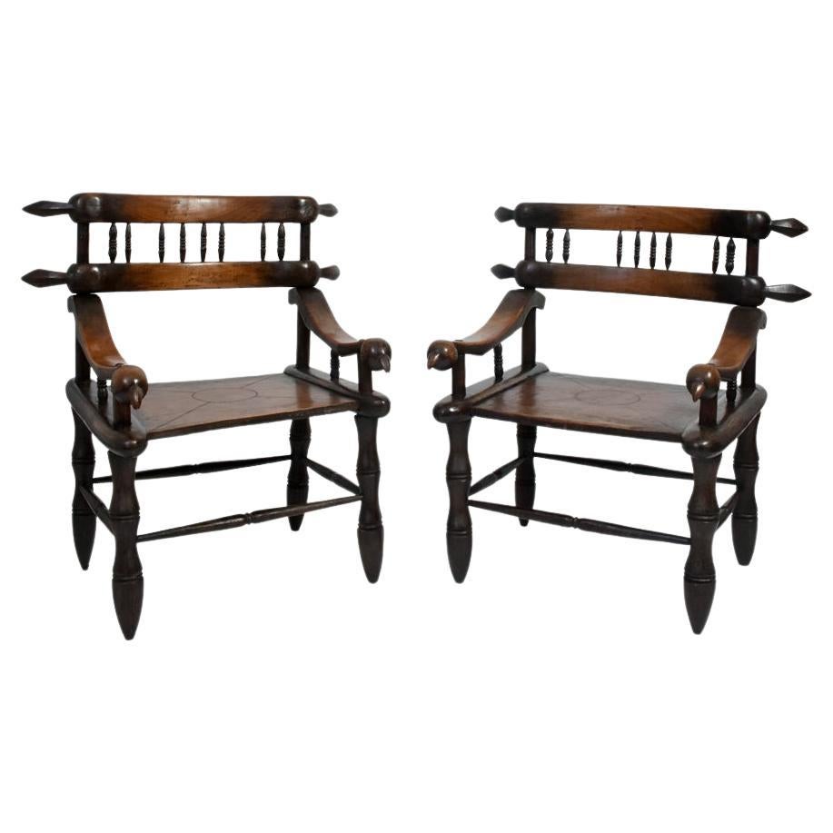 Pair of African armchairs, XXth c.