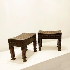 Pair of African carved wood stools