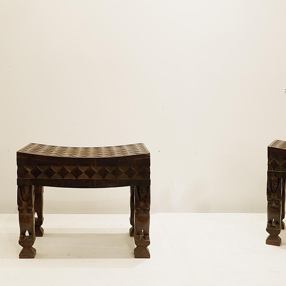 Pair of African carved wood stools For Sale 1