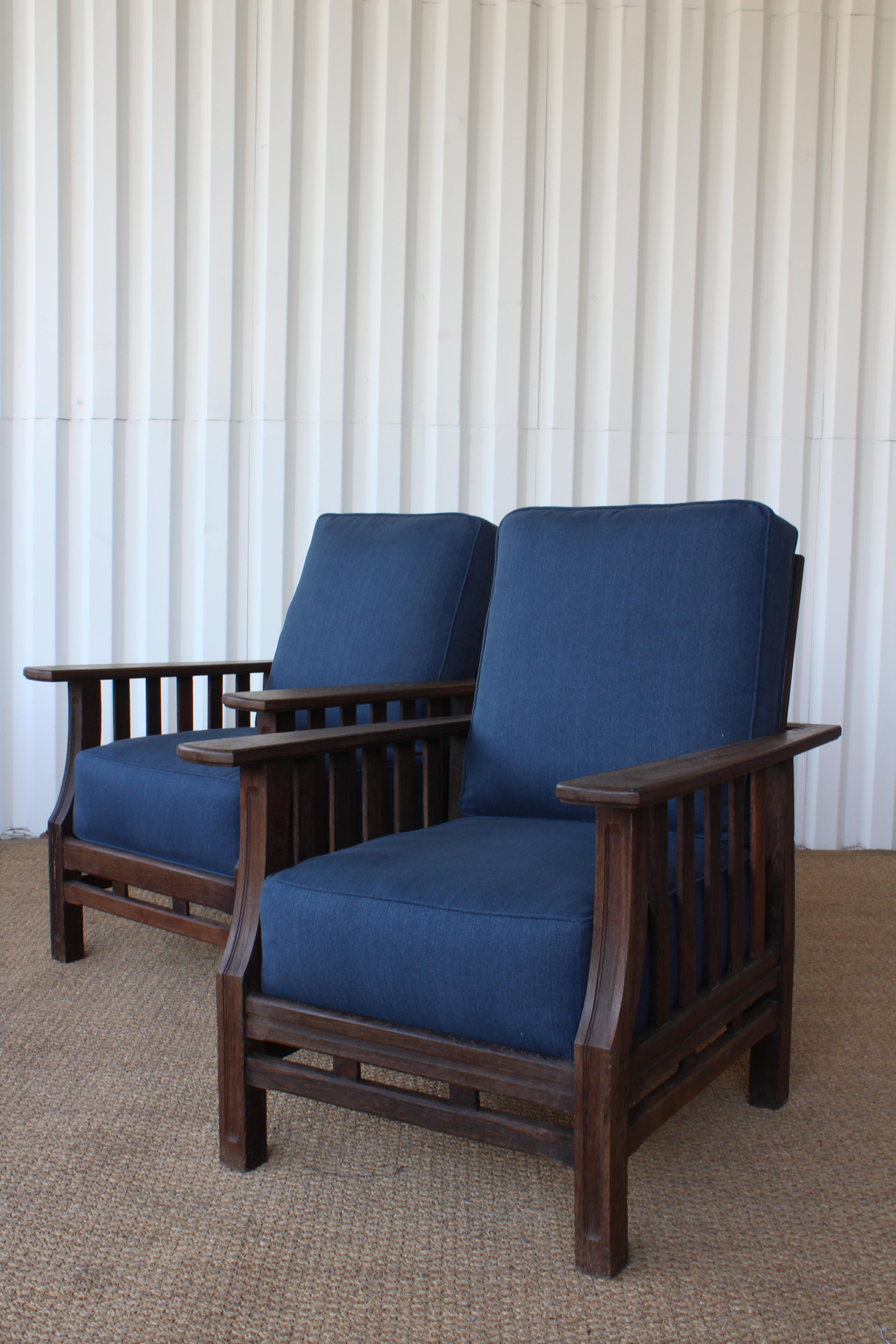 Pair of 1940s deck chairs in solid African wenge wood. New blue Belgian linen upholstery and new foam cushions. The backs are adjustable and can recline in three different settings. The stunning African wenge has been left as is with a very nice