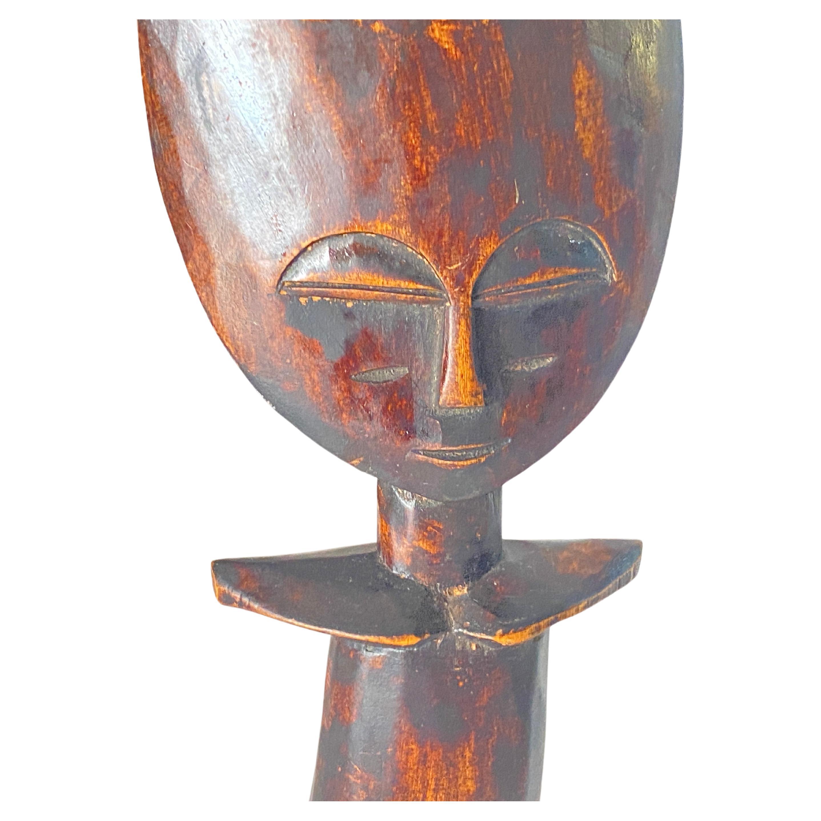 African pair of sculpture in wood handmade carved. Beautiful Patina.