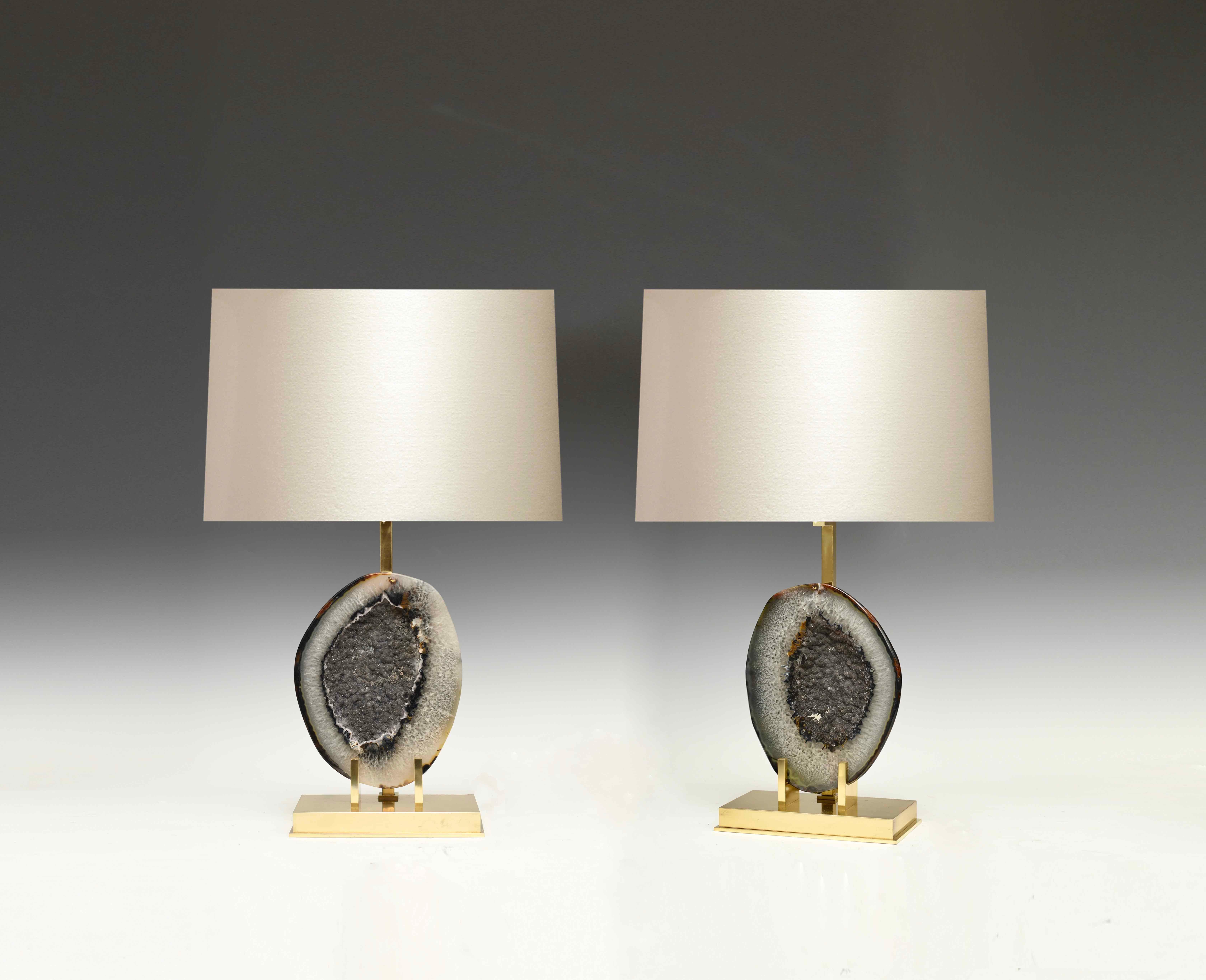 Pair of rare natural agate mounts as lamps with custom polished brass bases.
Each lamp installs two sockets.
Lampshade do not include.
 