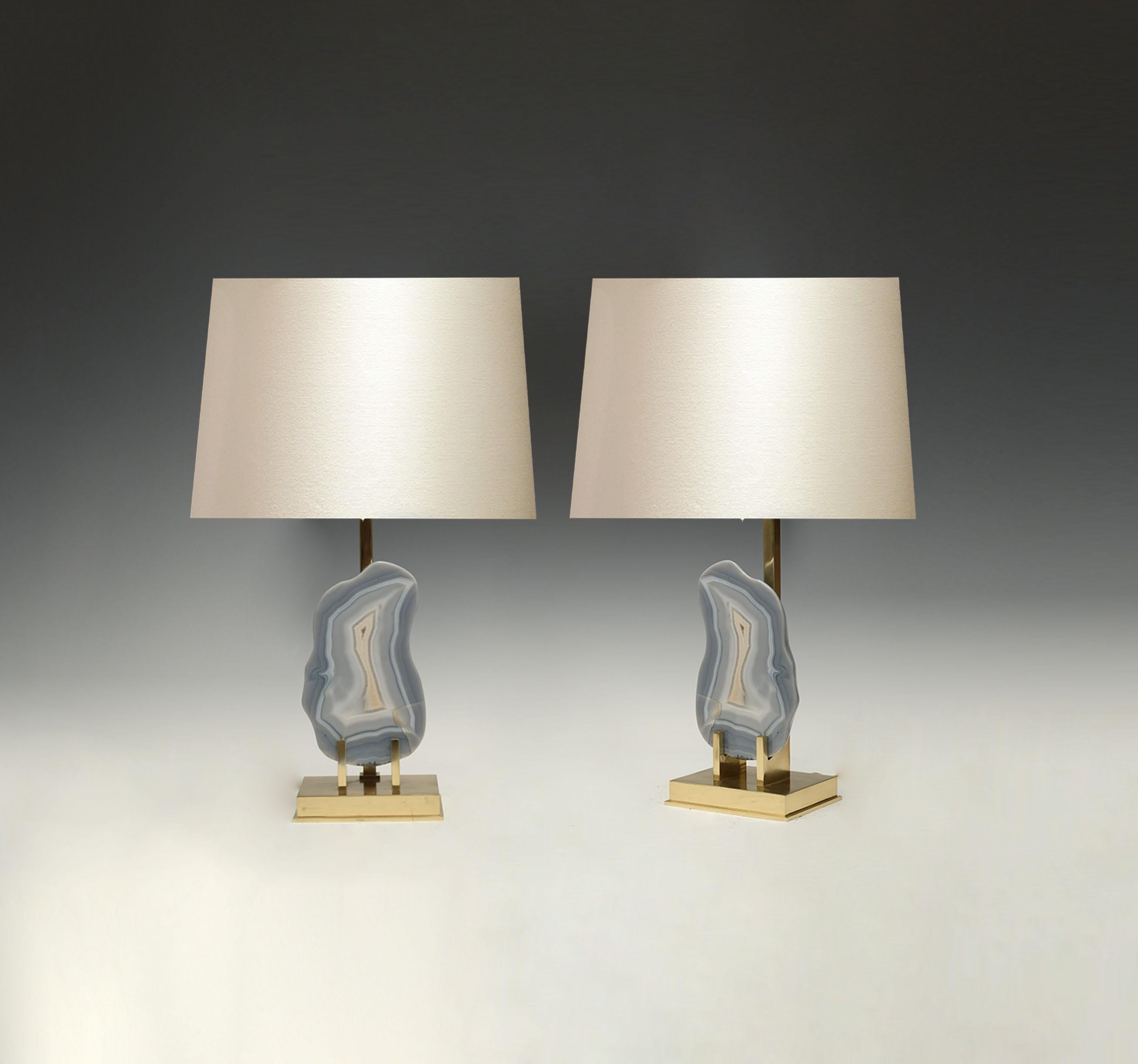 Pair of rare natural agate mounts as lamps with custom polish brass bases.
Each lamp installs two sockets.
Lampshades do not include.