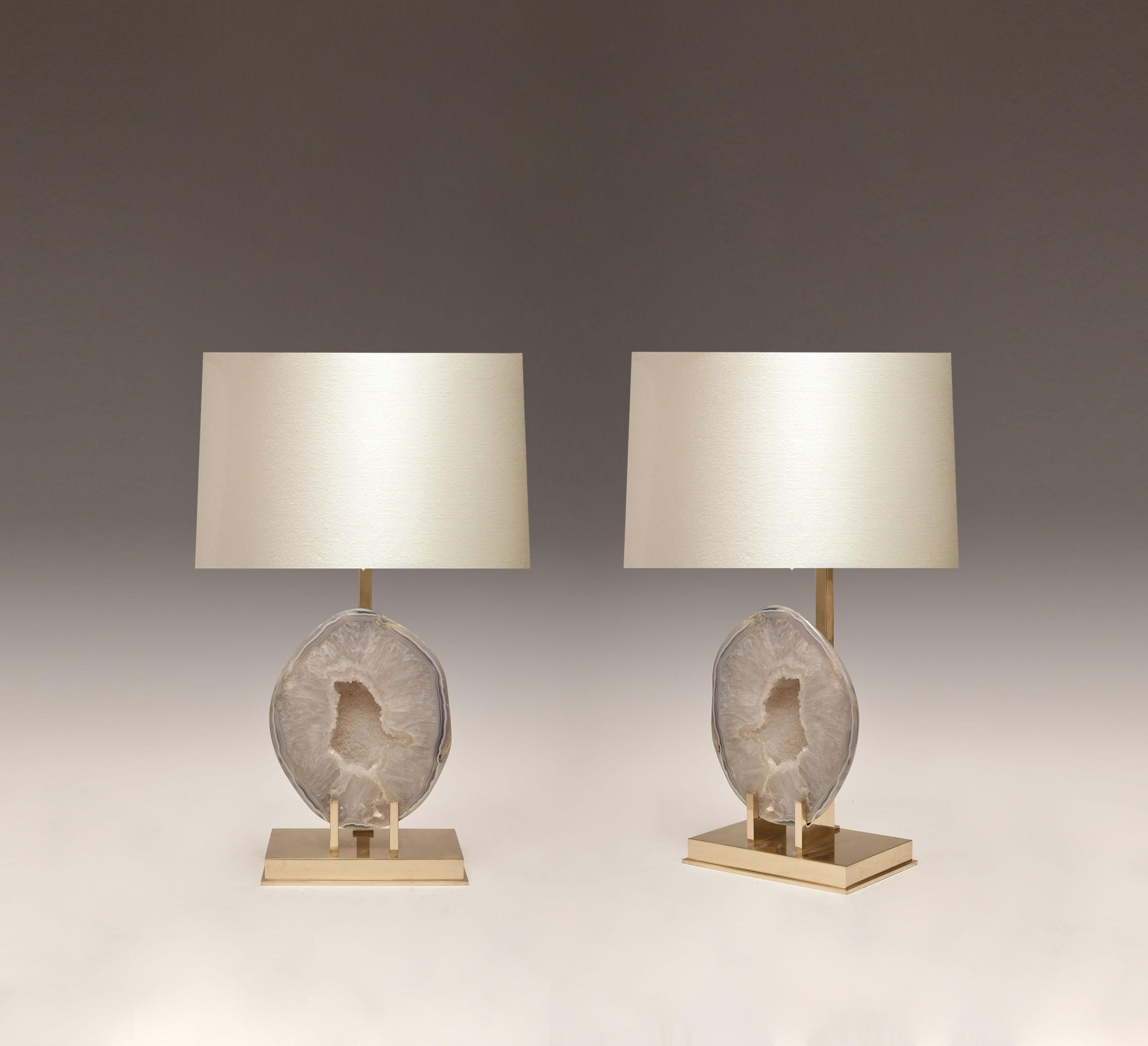 Pair of rare natural agate mounts as lamps with custom polished brass base.
Each lamp installs two sockets.
Lampshade do not include.